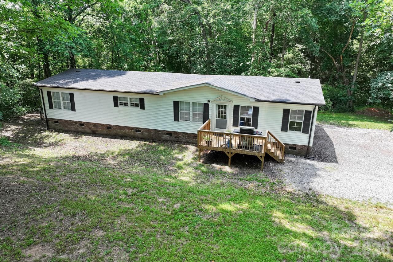 You will not believe how perfect this home is! Charming split-bedroom home on a quiet cul-de-sac is ready for its next owner. Featuring three bedrooms and two full baths, the home boasts a beautifully fully remodeled updated kitchen with stainless steel appliances including refrigerator. Granite countertops. New highly upgraded cabinets. New island with granite counter top. Smooth ceilings. The primary suite offers a huge walk-in closet and a tiled shower with shower pan. Ceiling fans in all bedrooms and living room. New front and rear deck.

Enjoy the rear deck overlooking a wooded back lot giving you plenty of privacy. This home has been completely renovated / remodeled by Z Varner Construction, with all new walls, ceilings, paint, cabinets, and flooring throughout. New luxury vinyl plank flooring. It also features a brand new roof installed in 2024 and a new HVAC system put in 2025/2026.