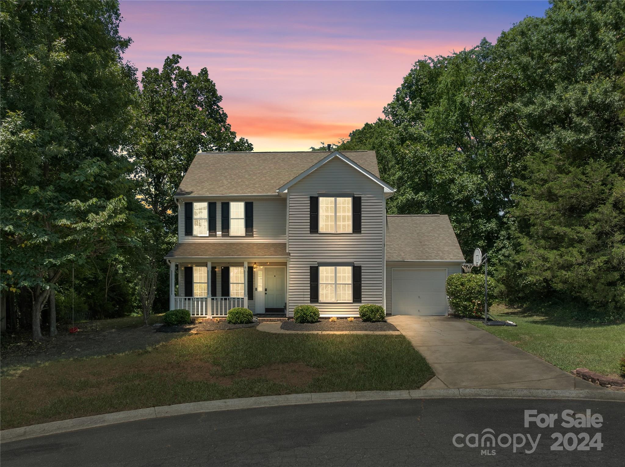 Welcome to this charming two-story home nestled on a partially wooded lot in a quiet cul-de-sac, offering abundant privacy and tranquility with no HOA. The open floor plan features beautiful hardwood floors and a cozy gas fireplace. The kitchen is a chef's dream, equipped with granite countertops, stainless steel appliances, and an eat-in area, plus a spacious walk-in pantry. Enjoy the serene surroundings from your rocking chair front porch. This home offers three spacious bedrooms and 2.5 bathrooms, providing comfort and convenience for everyone. 
Conveniently located to shops, restaurants and I77. This one is a must see!