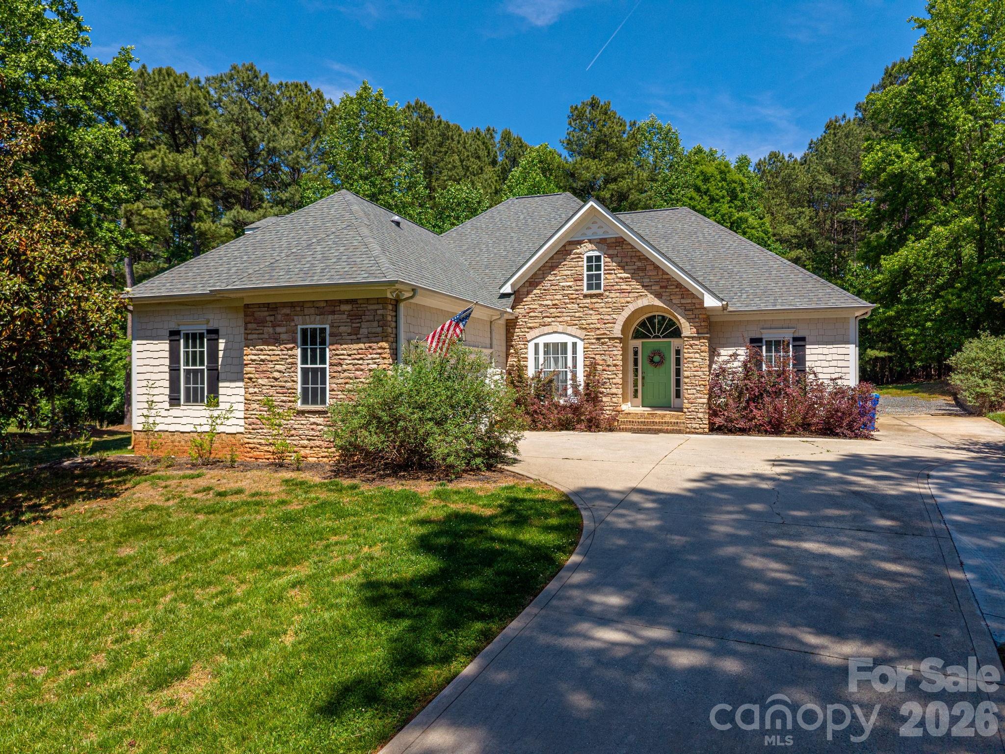Welcome to this beautifully maintained home nestled on just over an acre in the highly sought after Wildlife Bay community of Troutman. Surrounded by nature and just steps away from Lake Norman State Park, This property offers privacy, convenience, and exceptional lifestyle. Thoughtfully updated, the home features a newer roof and appliances (2020), tankless hot water heater, heat pump (2014), and updated light fixtures throughout. The kitchen shines with solid surface countertops, tile backsplash, stainless steel sink, and modern appliances, opening to inviting living and dining spaces accented by tray ceilings, elegant molding, and a cozy gas fireplace in the living room. The main level primary suite offers a peaceful retreat with tray ceilings, walk-in closet, updated bath featuring double sinks, garden tub and walk-in tile shower. The lower level features two additional bedrooms connected by a Jack and Jill bath.Upstairs you will find an additional bedroom/flex room, closet and full bath with a newly updated shower, plus a sun tunnel, bringing in natural light. Outside features a newer  back deck (2023), new patio with Rock wall, in-ground irrigation system, french drain (2023) invisible fence/2 collars and spacious yard. Wildlife Bay is known for its low turnover and high demand, offering amenities such as a playground, recreation area, nearby boat launch, and access to scenic walking trails. Lake Norman State Park features over 30 miles of walking and biking trails, excellent fishing, camping facilities, and boat rentals bringing outdoor adventures right to your doorstep. Experience the perfect blend of comfort, updates, and nature in this exceptional Lake Norman area home.