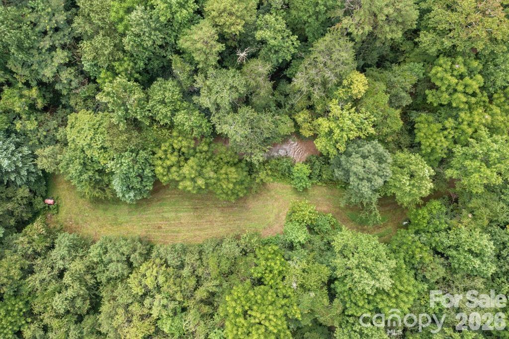 Unlock the potential of this 6.38-acre property ideally located just moments from I-40, offering exceptional visibility and accessibility for a wide range of commercial uses. This versatile parcel features a mix of partially wooded and cleared land, providing both natural beauty and immediate usability. With paved road frontage and commercial zoning already in place, this site is ready for development. Don’t miss this rare opportunity to secure a sizable commercial lot in a high-traffic area of Hickory, NC.