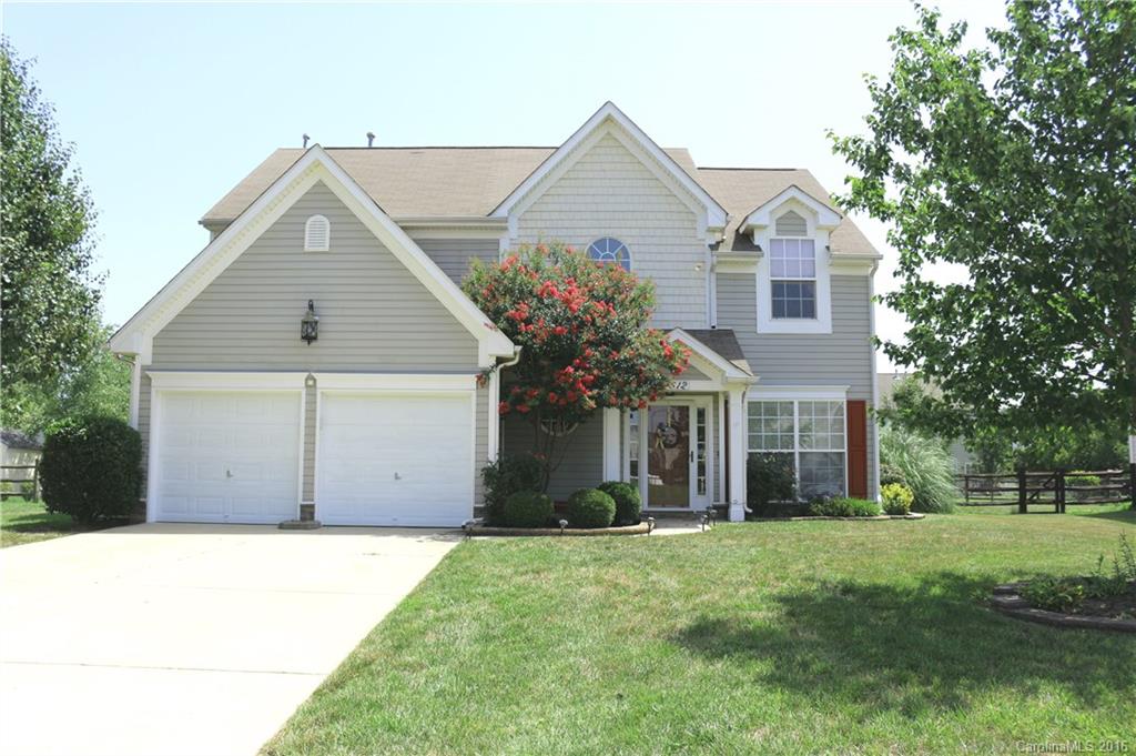 Wow !  Take in all of the custom touches by the seller that makes this home so special -  Laminate floors upstairs & down, extensive moldings & trim work & sconces in both rooms of see thru fireplace. Bead board back splash, silestone counter tops in kitchen and under cabinet lighting. Huge billiard room that could be bonus room or additional living area, sun room w/flexibility to raise windows to make screen porch, window seating in dining room and so much more -  Hurry this home won't last.
