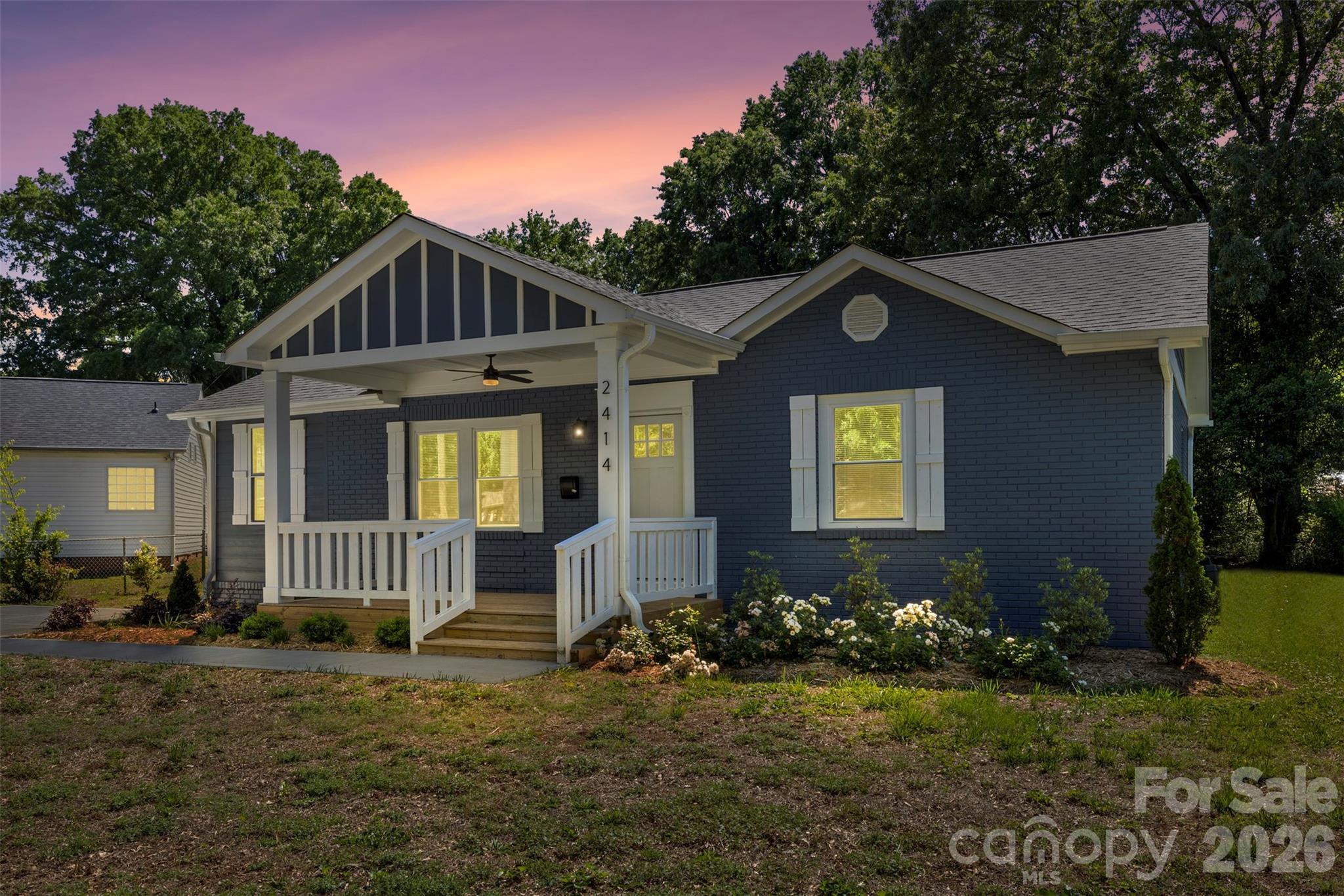 Welcome to this light-filled, move-in-ready 3-bed, 2-bath home perfectly situated in the heart of Ashley Park. Thoughtfully renovated inside and out, this property blends modern style with everyday functionality, offering an ideal retreat just outside Uptown Charlotte. Step onto the large front porch, perfect for morning coffee or relaxing evenings. Inside, you’ll find an inviting open layout with fresh finishes and abundant natural light. The remodeled kitchen features a breakfast peninsula, shaker cabinetry, quartz countertops, a designer backsplash, and generous counter space that's perfect for both everyday living and entertaining. A spacious laundry room provides extra storage, while both bathrooms offer clean, modern updates. All three bedrooms are generously sized and designed for comfort. Outside, enjoy a large flat yard with plenty of room to play, garden, or host gatherings. The back deck extends your living space outdoors, making it perfect for grilling or unwinding. A double driveway provides convenient off-street parking for multiple vehicles. With its prime location, modern upgrades, and move-in-ready condition, this Ashley Park gem checks all the boxes. Don’t miss your chance to call it home.