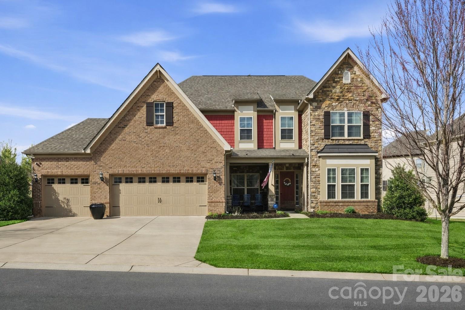 Welcome to this beautifully designed two-story home offering a spacious and functional layout with custom upgrades throughout.

The main level features a welcoming foyer, a formal dining room with a coffered ceiling, and a large great room with a coffered ceiling and stone fireplace with a wooden mantel. The kitchen is designed for both everyday living and entertaining, highlighted by a 13-foot island with outlets, crown molding, and a large walk-in pantry with custom shelving. The adjoining breakfast area features custom iron window accents and opens to a bright 3-season sunroom, creating a comfortable space to relax. A flex room with a shiplap accent wall provides the perfect office or additional living space, while a main-floor bedroom adds convenience for guests. The home also features a custom wine room and access to the outdoor patio, ideal for entertaining.

Upstairs, the spacious primary suite includes hardwood floors and custom closets. Two additional bedrooms and a large loft provide flexible living space, with the loft featuring custom cabinetry, a refrigerator, and surround sound—perfect for a media or recreation area.

The outdoor space is just as inviting, with in-ground sprinklers, outdoor lighting, a large patio with a wood-burning fire pit, and a fenced backyard. Additional storage is available with overhead garage shelving.

With thoughtful design, custom architectural details, and great indoor and outdoor living spaces, this home offers comfort, functionality, and style.