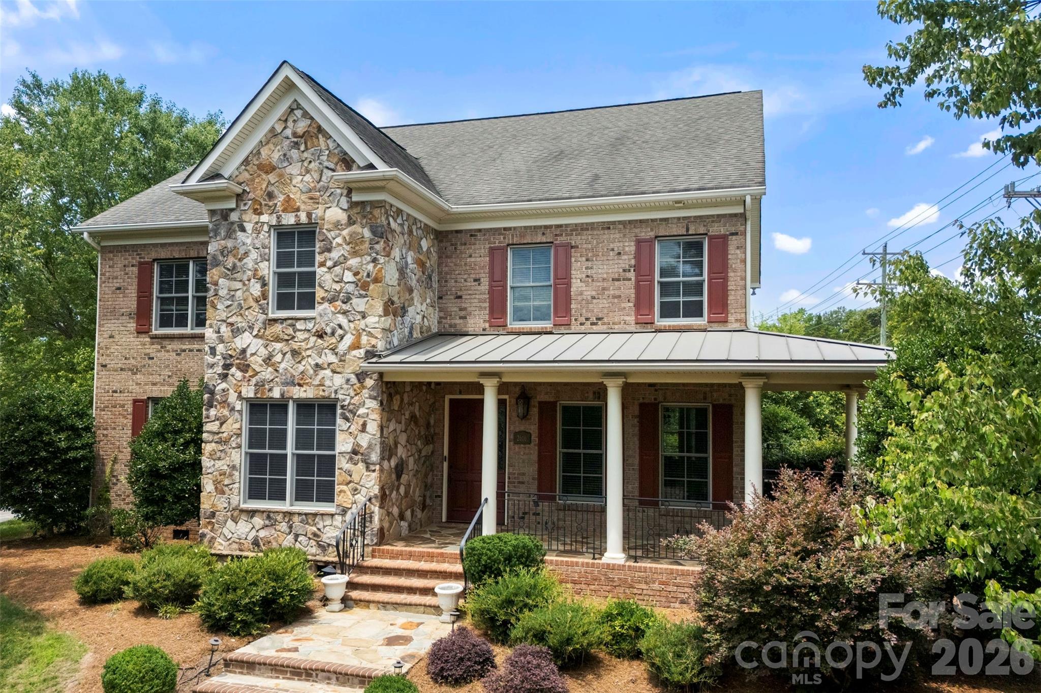 Main-Level Primary Suite | Cul-de-Sac Living | Wraparound Porch | 5 Bedrooms | South Charlotte Lifestyle

Tucked on a quiet cul-de-sac in one of South Charlotte’s most established neighborhoods, 2616 Ladley Court delivers the kind of space, character, and everyday livability that’s increasingly hard to find.

A welcoming stone exterior and wraparound front porch set the tone for a home that feels both grounded and inviting. Inside, nearly 4,000 square feet unfolds with warm hardwoods, abundant natural light, and a layout designed for real-life flexibility.

The main-level primary suite offers rare convenience and privacy, while multiple living areas and flexible rooms support everything from work-from-home to multi-generational living. A spacious bonus room easily transforms into a media space, playroom, gym, or guest retreat.

At the center of the home, the kitchen and family room connect seamlessly, creating an easy flow for daily living and entertaining. Built-ins and generous gathering spaces give the home both function and character.

Upstairs, four additional bedrooms provide comfort and separation, making it easy to accommodate family, guests, or evolving needs.

Out back, a private patio and integrated surround sound system set the stage for effortless outdoor living, from quiet evenings to game-day gatherings.

Located minutes from SouthPark, top-rated schools, dining, shopping, and recreation, this home blends space, setting, and lifestyle in one of Charlotte’s most desirable corridors.