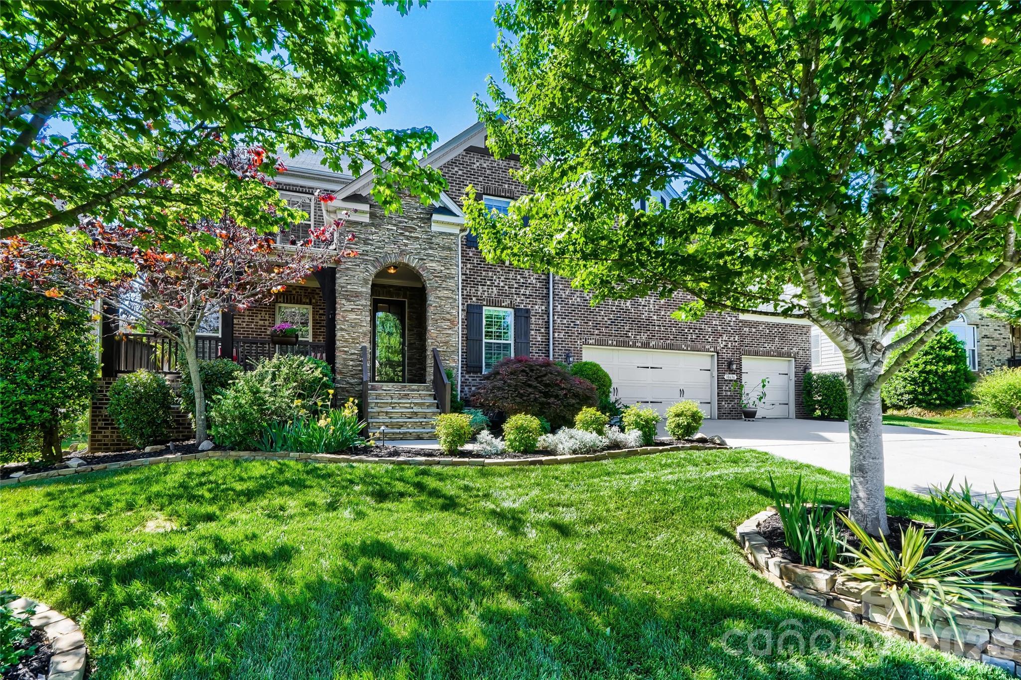 Welcome to 10636 Rippling Stream Dr. NW, Concord, NC, a stunning and highly sought-after Alpine Plan by Shea Homes, offering a rare combination of luxury upgrades, thoughtful design, and an exceptional location. Ideally positioned just 30 minutes to Uptown Charlotte, 20 minutes to Birkdale Village, and 15 minutes to Lake Norman, this 4 bed/ 3.5 bath home provides convenient access to premier shopping, dining, and outdoor recreation while enjoying the comfort of a well-established community. Located within the top-rated Cabarrus County Cox Mill school district, this property adds even more value for those seeking both quality and convenience.

From the moment you arrive, the home’s impressive curb appeal is highlighted by manicured landscaping, custom exterior lighting, and a welcoming covered entry. Inside, the open and airy floor plan is enhanced by plantation shutters throughout, creating a refined aesthetic with added privacy and energy efficiency. The main living areas feature custom built-in bookshelf units in the office, living room, and loft, blending functionality with elevated design.

The kitchen is both stylish and practical, featuring granite countertops, abundant cabinetry, and upgraded Shelf Genie pull-out drawers and plate organizers for effortless organization. It opens seamlessly into the main living space, where soaring ceilings, natural light, and a stone-accent fireplace create an inviting atmosphere ideal for both everyday living and entertaining.

The spacious primary suite serves as a private retreat, complete with custom Closet by Design walk-in systems, including thoughtfully designed shelving and drawers. Every additional bedroom also features upgraded closet systems, ensuring optimized storage throughout the home.

Step outside to experience one of the home’s most impressive features—a huge screened-in, covered pergola with a paver patio and circular seating area, designed for year-round enjoyment. With a built-in gas line for grilling, ambient lighting, and a serene backyard setting, this outdoor space is perfect for entertaining or relaxing evenings. The seven-zone irrigation system, enhanced pressure pump, and professional landscaping make maintaining the yard both easy and efficient.

Additional upgrades include a custom Closet by Design three car garage with Trex Tile flooring, a 220V EV charging outlet, bonus room wired for surround sound, attic fan, paver walkway, and storm doors for added comfort and convenience.

Residents of the Winding Walk community enjoy outstanding amenities, including an outdoor pool with clubhouse, tennis courts, basketball courts, playgrounds, and scenic walking trails, offering a lifestyle that extends well beyond the home itself.

This is a rare opportunity to own a meticulously upgraded home in a prime Concord location near Charlotte’s most sought-after destinations. Don’t miss everything 10636 Rippling Stream Dr. NW has to offer. ***Please note sellers have limited showings to Wednesday and Sunday only***