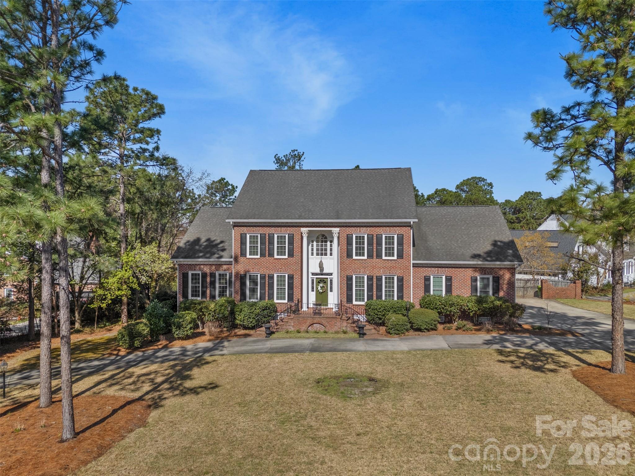 Grandeur in Columbia!  Welcome to this grandiose 5 bedroom, 5 bath home in the highly sought after Wildewood neighborhood of Columbia South Carolina.  This meticulously cared for home boasts two master bedrooms, one on the ground level, the third bedroom with it’s own ensuite bathroom, and the 4th and fifth bedrooms share a jack n jill bathroom.  Upon entering, you will notice the high ceilings, marble foyer, hardwood floors, and extensive wood craftsmanship in the moulding and trim throughout the home.  The open concept kitchen with Thermador appliances is a chef’s delight.  It opens up to a large breakfast room and adjoins the dining room for ease when entertaining.  Notice the elegant sitting room perfect for afternoon tea, the warm great room with a fireplace, buit-ins, and wet bar, and the sunroom with floor to ceiling windows, perfect for an early morning read or meditation.  Upstairs, in addition to the bedrooms you’ll find a large bonus room with vaulted ceilings, perfect for the hobbyist.  In addition to the main living areas there is a beautiful covered deck in the back of the home, perfect for lounging and bbq’s, and a lovely free standing day room pefect for art work, gardening, or storage.  In addition to the two car garage there is also the pefect workshop already set up.  Bonuses include newer kitchen appliances, newer cabinetry w/ soft close features, gas added for stove, gas log set-up, gas access point added outside, newer flooring in sunroom, recently refinished hardwoods upstairs, network closet, 9 ubiquity home security cameras installed, vinyl windows, shutters, gutter guards, back deck, insulation in attic, newer HVAC 3.5 ton for second level, newer duct work for second level, entire yard has been recently landscaped w/ St Augustine grass and sprinkler system.  Come and view this delightful property and see what the Wildewood neighborhood, and all of its amenities, have in store for you…golf, tennis, pool, country club!  Wildwood awaits! Disclaimer:  CMLS has not reviewed and, therefore, does not endorse vendors who may appear in listings.