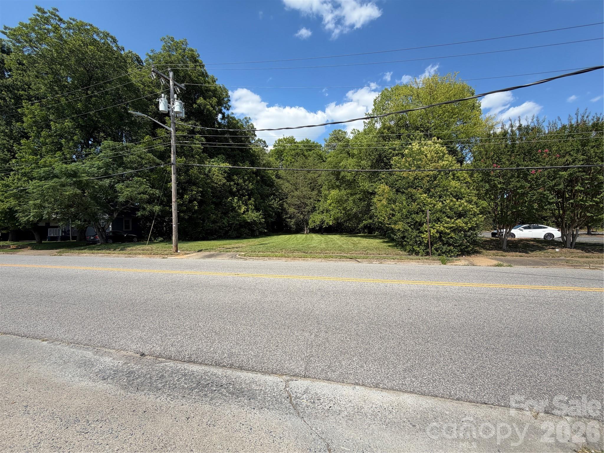 Excellent development opportunity in the City of Rock Hill! Two adjoining parcels (Tax Map #596-03-03-023 & #596-03-03-024) being sold together, offering added flexibility for future development. Vacant land zoned Multifamily, ideal for apartments, townhomes, duplexes, or other residential investment opportunities (subject to city approval). Conveniently located near shopping, dining, schools, and major roadways. Rare opportunity to secure multifamily-zoned land in a growing area!
