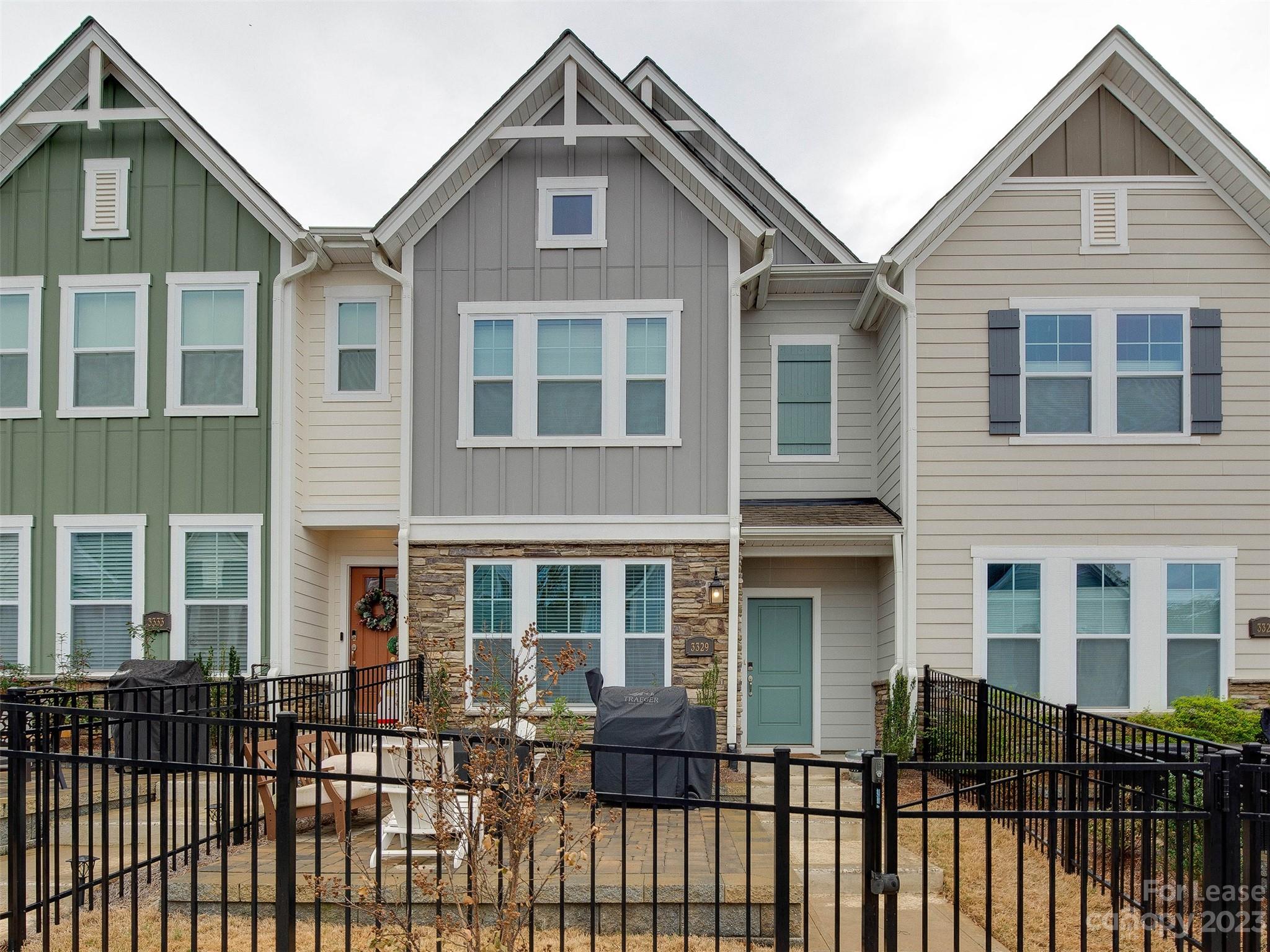 Stunning almost new townhome for rent in hot Villa Heights. Live seconds from the best of the best Charlotte has to offer! Tucked perfectly between NoDa and Midwood and all the hot spots.  This unit is in great condition and so close to it all! The front fenced yard and paver patio is an excellent place to entertain family and friends. Walking into the home you are greeted by the large living room that opens up to the chef's kitchen complete with gas cooktop and stainless steel appliances.  On the middle floor is the bright and spacious primary suite with large shower, dual vanities and custom tile as well as guest bedrooms that have their shared bath. The washer and dryer are included as well. Upstairs is the loft style bedroom that would be ideal as a home office, guest suite, work out room or game room! Don't miss the large 2 car garage and guest parking in the neighborhood! Wired for ATT fiber if needed. The fourth bedroom/bonus on 3rd floor doesn't have a door. Take a look today!