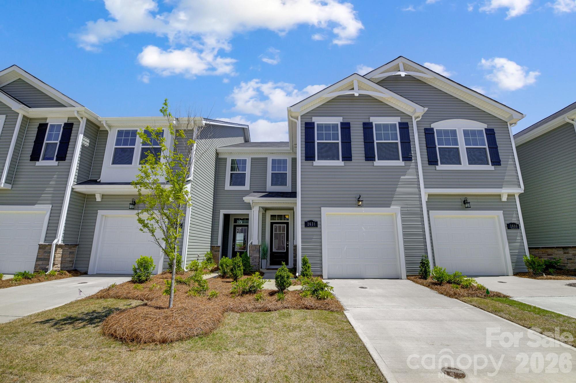 Ideally located just minutes from Uptown Charlotte, Charlotte Douglas International Airport, premier shopping, and dining, this elegant townhome offers refined living with everyday convenience. The Amira floor plan showcases 3 bedrooms, 2.5 baths, and 1,769 square feet of thoughtfully curated space designed for both style and comfort. A welcoming entryway sets the tone with a graceful wraparound staircase, ample pantry storage, and an expansive main living area that flows beautifully—perfect for hosting or unwinding in a sophisticated setting. Upstairs, the private bedroom suites provide a serene retreat, offering comfort, functionality, and privacy. Nestled within The Townes at Cheyney, residents enjoy low-maintenance living, planned amenities, and seamless access to I-485, I-77, and I-85, placing the best of Charlotte just moments away.