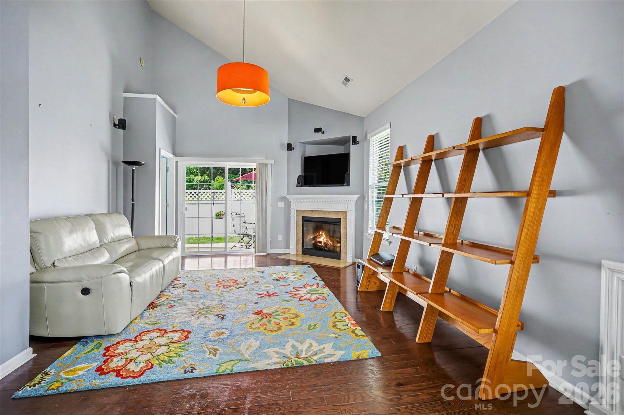 PRICED TO SELL! This highly sought-after, well-maintained end unit townhome features a primary bedroom, full bath, powder room and equipped laundry on the first floor with two additional bedrooms and another full bath on the upper level! 

Beautiful wood floors enhance the open living area featuring vaulted ceiling, a gas fireplace and sun drenched view of the patio and private, fenced yard! The modern kitchen boasts of a suite of higher end Whirlpool appliances and looks out onto the front landscaping. Just off the kitchen area is the convenient laundry, pantry and half bath.

The primary retreat has a soaking tub/shower and a large walk in closet. The upstairs space features two additional bedrooms with two access areas to storage. 

Sliding doors open to the backyard, offering privacy and space to entertain. 

The glistening community pool is just steps away and the community location cannot be beat!
Just 7 miles to the Charlotte Douglass Airport with CaroMount and Atrium medical facilities close by!
The newly renovated McGill Family YMCA has something for every age and is in walking distance!
Located between the charming downtown areas of Belmont and Mount Holly, the Waters Edge community is nestled in trees and feels secluded.

HOA fees include irrigation, lushly maintained front yards and shrubbery, the pool and clubhouse.