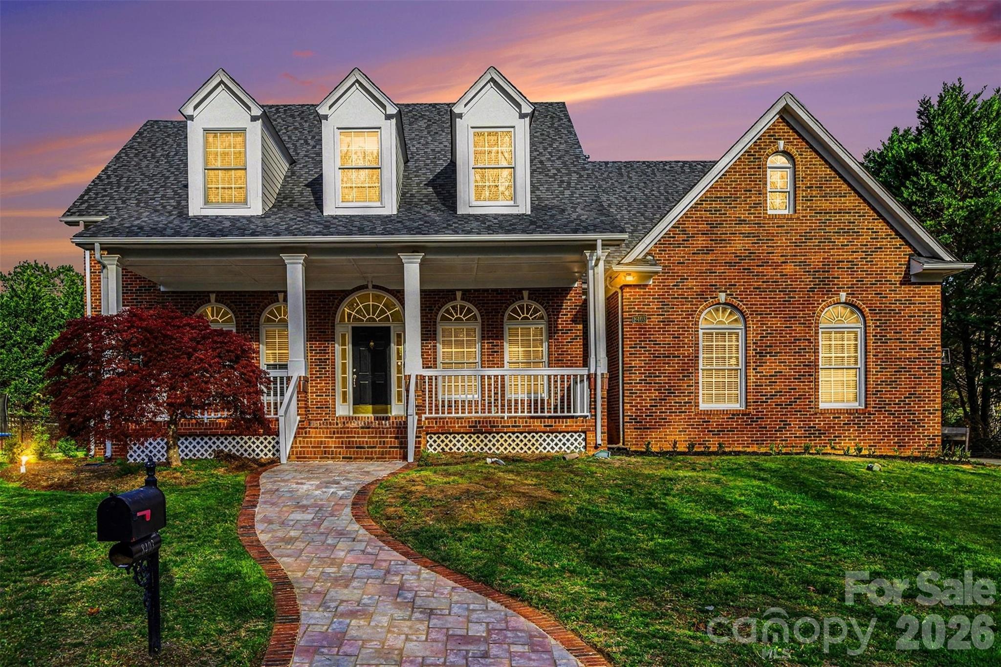 Full brick home located in the award winning Marvin school district, what else could you ask for?! Start your next chapter in a home where the major updates are already done for you—featuring a brand new roof and newly installed 7-zone irrigation system (2025). This full brick home welcomes you with an inviting rocking chair front porch, perfect for slow mornings or relaxing evenings.

Inside, freshly refinished and richly stained hardwood floors (2025) span the main level, complemented by new light fixtures and ceiling fans that bring a fresh, updated feel. The enclosed office with custom built-ins provides a functional and stylish space for working from home or a quiet retreat.

The stunning two-story living room is filled with natural light from a wall of windows and anchored by a cozy fireplace with built-ins, creating a space that feels both open and welcoming. The kitchen features white cabinetry, stainless steel appliances, and a layout designed for easy everyday living and entertaining.

The main-level primary suite is thoughtfully positioned for easy main-floor living, while additional spaces provide flexibility for guests, hobbies, or everyday needs. Step outside to the expansive back deck overlooking a private backyard—ideal for everything from peaceful mornings to hosting friends and family.

Located in the highly desirable Waxhaw-this home is close to Blakeney and Waverly shopping centers, downtown Waxhaw, Ballantyne Bowl, Marvin Efird Park and about 30 minutes to uptown Charlotte!