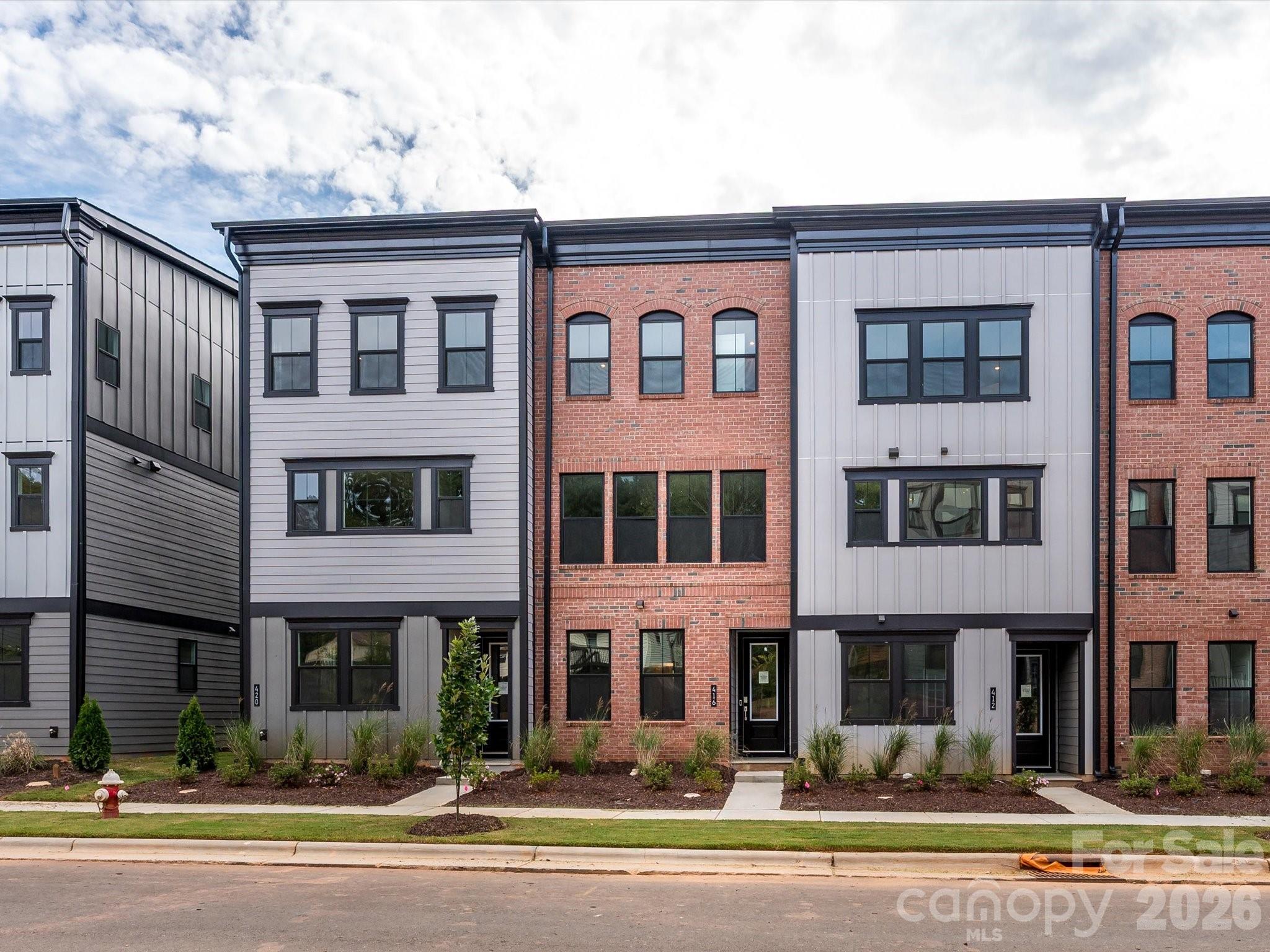 Looking for walkability and small town living? The Hudson at Old Town Village is the perfect blend of small town charm and the appeal of city walkability. With 3 bedrooms and 3 full baths, this home has just the right amount of space to grow and the perfect design selections to spark inspiration. On the first floor, the guest suite is ideal for hosting friends or family complete with a tile surround walk-in shower and large closet. Upstairs, the layout is functional and flows beautifully. The primary suite is a true oasis you'll never get tired of.

First floor guest suite with tile surround walk-in shower and bright sunny windows.
Gourmet kitchen with huge oversized island, direct vent, white cabinetry, speckled quartz countertops, and upgraded hardwood pantry shelving.
Unobstructed tree-lined views from covered outdoor living space and primary suite.
Upgraded tile surround secondary shower.