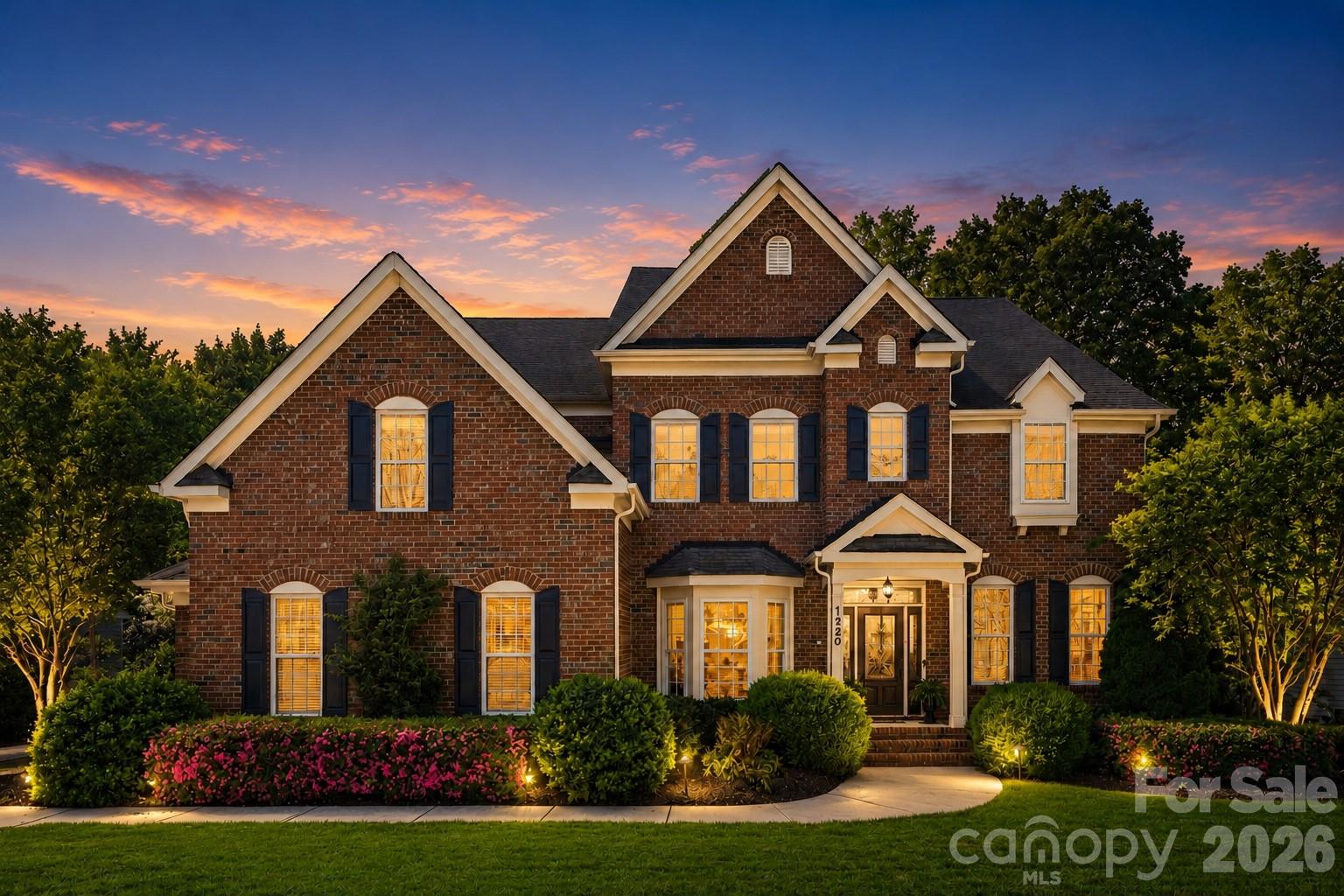 Now offered at just $899,999, this meticulously maintained one-owner home presents an incredible opportunity to own nearly 5,000 square feet in sought-after Lawson. Featuring 5 bedrooms, 5.5 bathrooms, a dedicated office, two bonus rooms, and a 3-car side-load garage complete with a vehicle lift, a unique feature that offers incredible flexibility for car enthusiasts, additional storage, or workshop space.  This home delivers an exceptional combination of space, functionality, and value at a price that's hard to ignore.

Inside, you'll find timeless architectural details including extensive wainscoting, box molding, and a dramatic two-story family room filled with natural light overlooking a private, tree-lined backyard. The spacious kitchen features an induction cooktop with vented hood, convection wall oven, and convection microwave.

Each of the five bedrooms includes its own private en suite bathroom, providing comfort and privacy for family and guests alike. A professionally installed EV charging station adds modern convenience to this exceptional home.

Located in the amenity-rich Lawson community with pools, clubhouse, fitness center, tennis and sport courts, playgrounds, and scenic walking trails, this home is conveniently located near top-rated schools, historic downtown Waxhaw, and South Charlotte.

A professional pre-listing inspection was completed prior to listing. The inspection identified routine maintenance items, many of which have already been addressed. The full inspection report is available upon request.

With nearly 5,000 square feet, 5 private en suites, exceptional care, and an incredible new price of just $899,999, opportunities like this don't come along often.