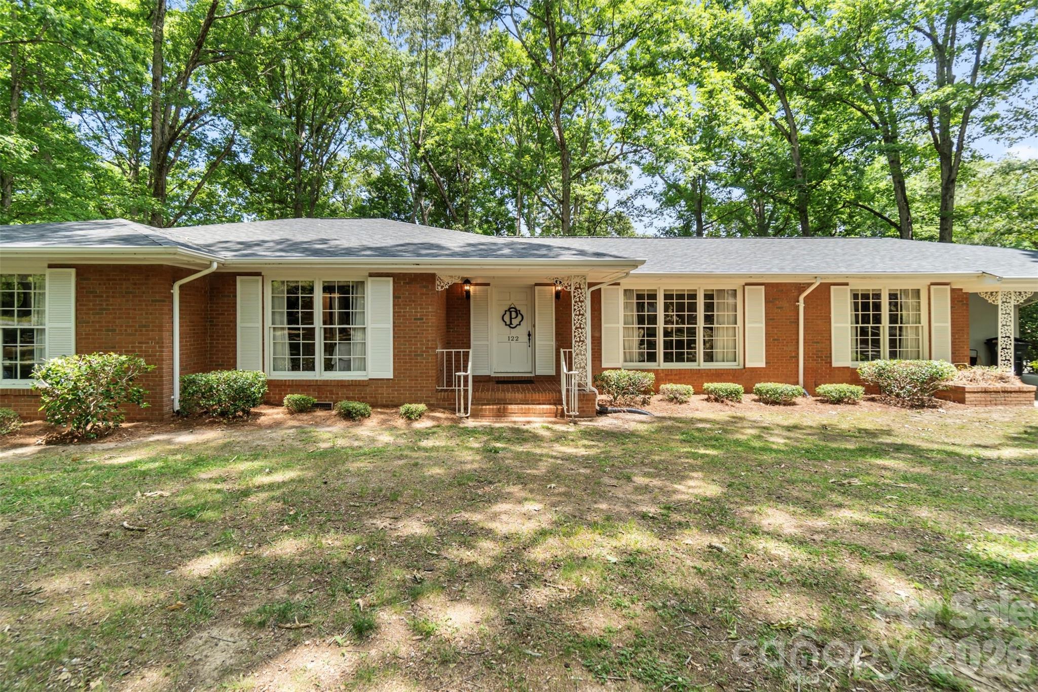 Sprawling 3500 square foot full brick ranch on 1.07 acre lot with 2-car carport.   4 bedrooms and 2 baths on main level, Large Kitchen with breakfast room, Laundry room, Living room and Dining Room for great entertaining, Cozy Den with fireplace, built-in desk and book shelves, large windows filling the home with lots of light. Basement with rec room, fireplace, 5th bedroom and full bath.  This home is on a dead-end street and private.   A perfect home for a large family.  Priced to sell so hurry before it is gone! You will be impressed!