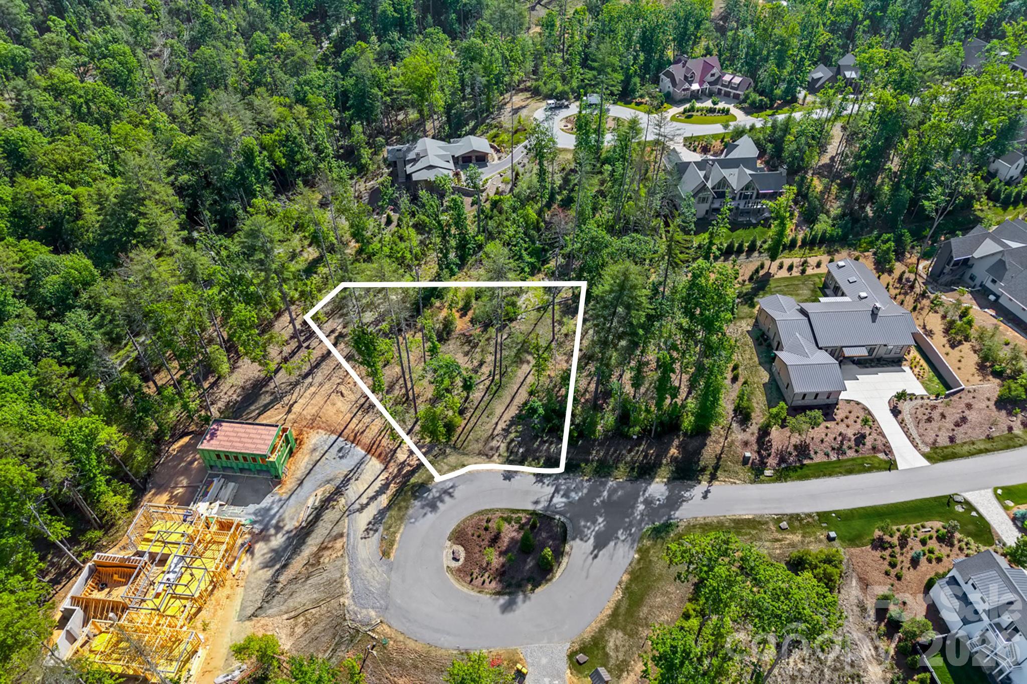 Tucked at the end of a quiet cul-de-sac within Asheville’s premier gated luxury community, this exceptional .67-acre homesite offers a rare opportunity to build a custom residence in the heart of The Ramble Biltmore Forest. Surrounded by the community’s signature natural beauty and timeless architecture, Lot 616 at 325 Flowering Vine Court offers a peaceful, private setting while remaining just minutes from Downtown Asheville, Biltmore Park, and the Blue Ridge Parkway.

Rooted in the legacy of the historic Biltmore Estate and inspired by Olmsted-designed planning principles, The Ramble is renowned for its unparalleled blend of luxury, wellness, and nature. Residents enjoy miles of wooded trails, curated parks, and world-class amenities including the Living Well Center with a heated saline pool, state-of-the-art fitness facility, tennis and pickleball courts, and vibrant gathering spaces. Longmeadow Park further elevates the lifestyle experience with gardens, open green spaces, a fire pit, playground, and community gathering areas, creating one of Asheville’s most sought-after living experiences. An exceptional opportunity to create a custom mountain retreat within one of Asheville’s most coveted gated communities.