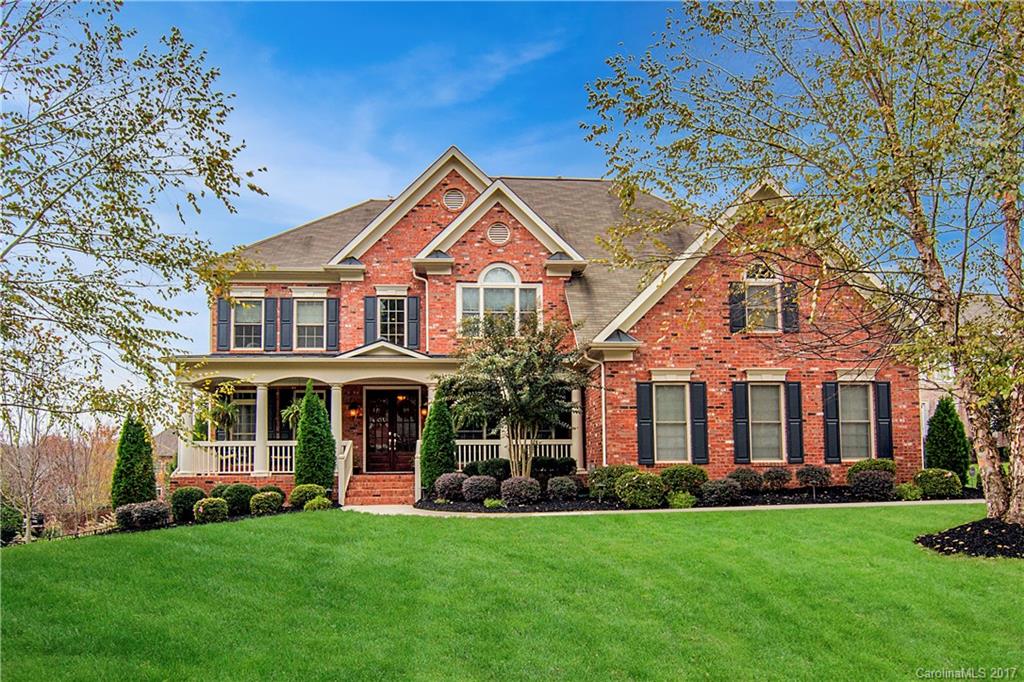 Exquisite 3 story home on large cul-de-sac lot in sought after BridgeMill! Desirable Columbia open floor plan. Soaring ceilings w/2-story windows pour natural light onto gorgeous hardwoods. Large kitchen w/ center island seating, breakfast area & office niche. Huge master w/trey ceiling & spa-like bath. Custom built ins and blinds. Stacked stone fireplace. Perfect for entertaining inside & out w/ screened porch & back deck. Large private fenced backyard. Custom garage storage system.