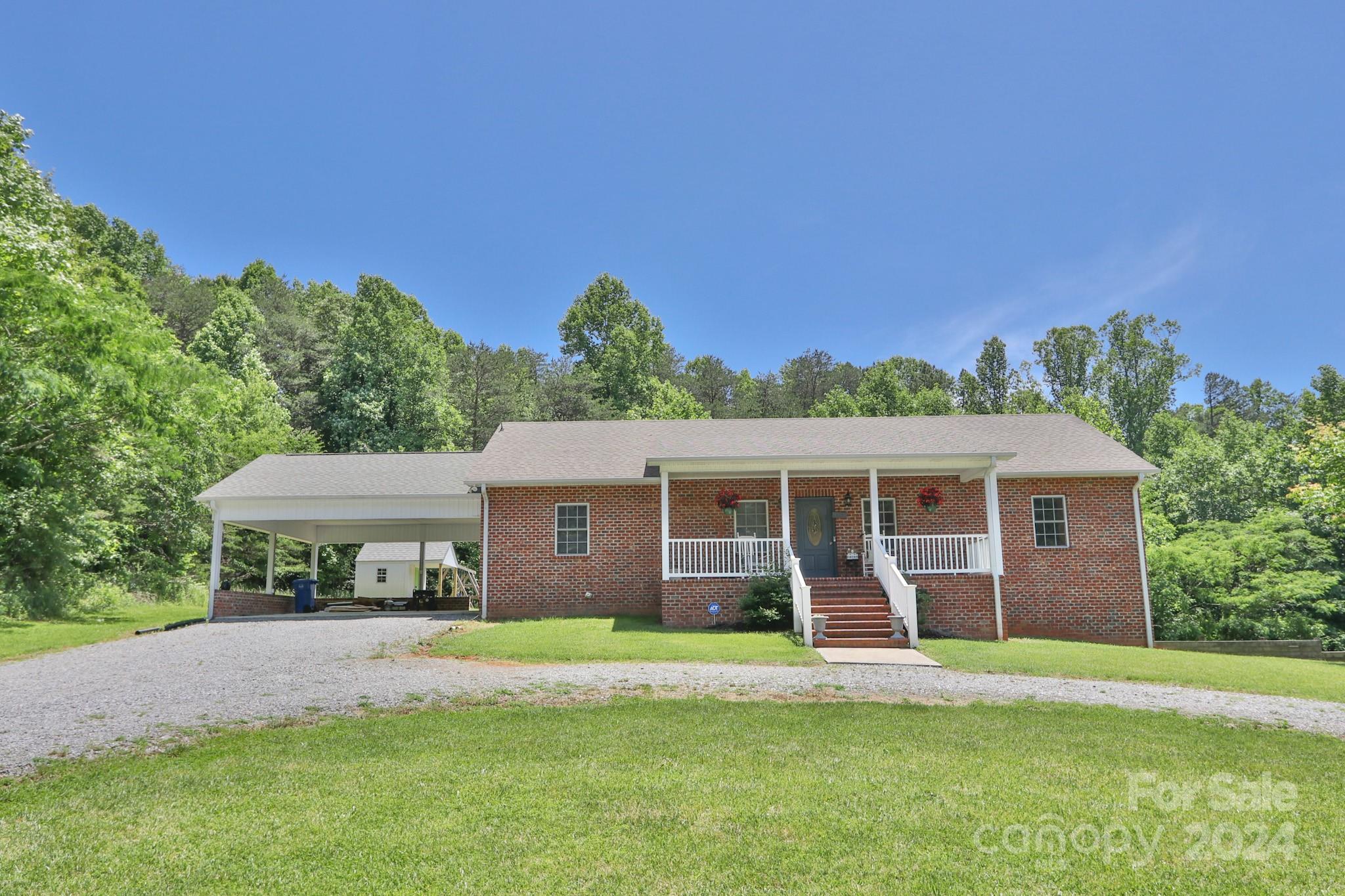 Welcome to this charming 3BR/2BA home nestled on a generous .91-acre lot.  As you step inside, you're greeted by an inviting sunroom, flooded with natural light, creating the perfect spot for relaxation or hosting guests. The heart of the home boasts a spacious living area, ideal for cozy evenings. Adjacent is the well-appointed kitchen with ample cabinetry. But that's not all! This home also boasts an unfinished basement, offering endless possibilities for customization and expansion to suit your unique lifestyle needs. Step outside to discover the expansive .91-acre lot, offering endless possibilities for outdoor enjoyment. Whether you're unwinding on the covered porch with your morning coffee or hosting summer barbecues in the sprawling backyard, this property provides the perfect blend of indoor-outdoor living. Don't miss your chance to make this your own slice of paradise! *Playhouse, Swing set, light fixture in child's bedroom and chalkboard in the kitchen not included*