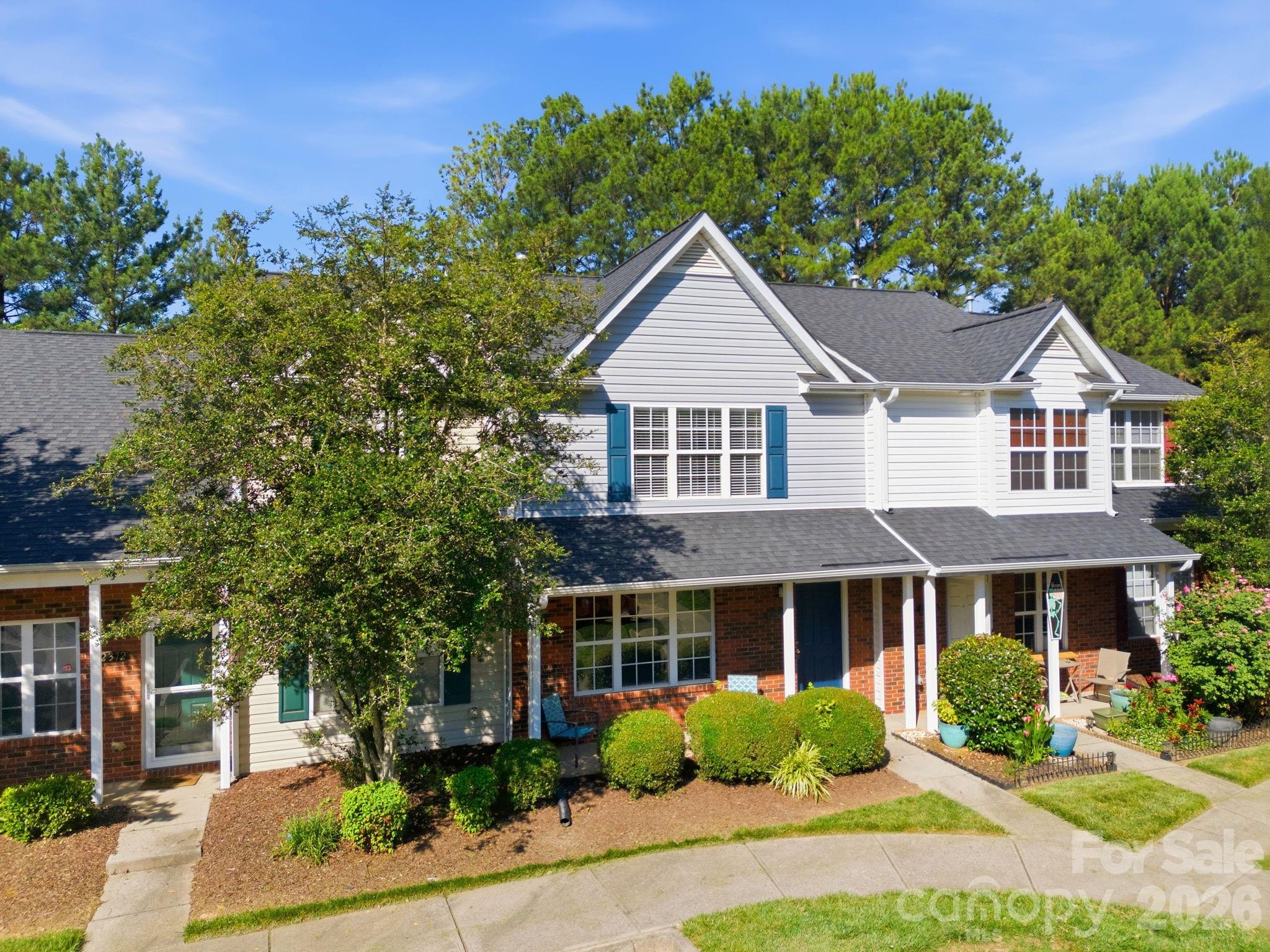Great floor plan with a spacious living area, efficient kitchen with work island, plus two ensuite bedrooms.  Laundry room with washer and dryer, and the kitchen fridge also remains to save you money and time on moving day.  Covered front porch will keep your packages and guests dry.  The rear patio backs up to a wooded common area for backyard privacy.  Enjoy the community pool and convenient location near shopping and restaurants at Hwy 16/Mt Holly-Huntersville Road.   You will have a variety of options for travel to downtown Charlotte, the airport, Gaston County, Denver, and Lake Norman area.   Only 2 miles to the Riverbend Boat Ramp, where you can launch a canoe/kayak and paddle 6 miles of the Catawba River Blueway - Mountain Island Lake section.

Move-in ready and available for a quick closing, if needed.