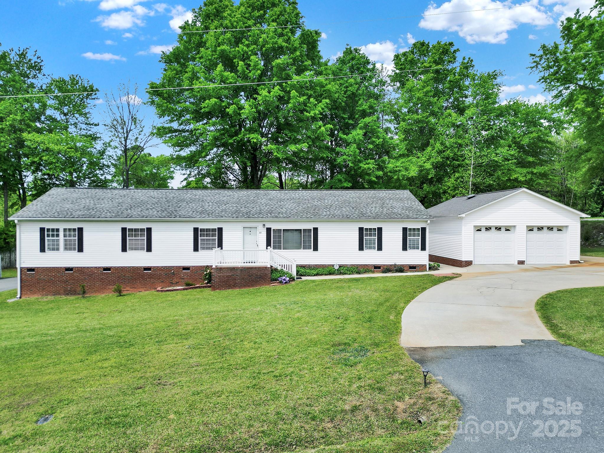 Welcome to your peaceful retreat! This beautiful 4-bedroom, 2-bathroom home sits on a generous 2.5-acre lot, offering space, privacy, and endless potential. Built in 2005, the home still feels like new, with a spacious interior that's perfect for comfortable living and entertaining.

Enjoy your mornings or evenings on the covered back porch, taking in the quiet and open surroundings. Need extra space for vehicles, hobbies, or storage? You’ve got it—with both a detached two-car garage and a separate carport.

Whether you’re looking for room to grow, space to roam, or simply a move-in-ready home with land to love, this one checks all the boxes.