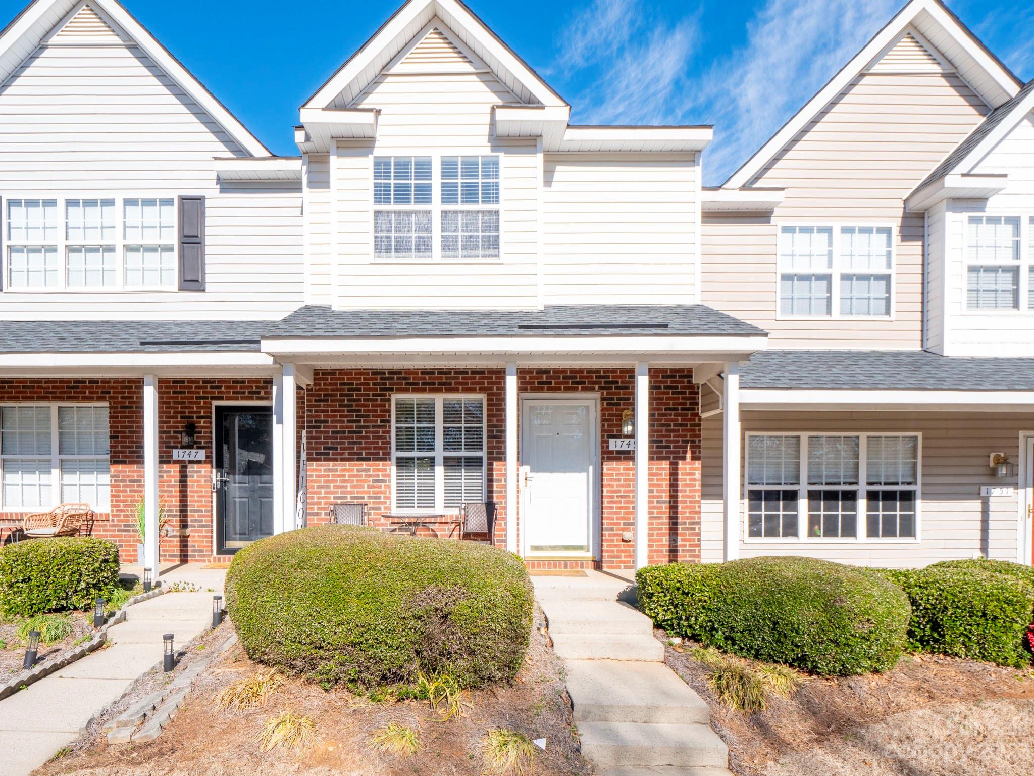 If you are looking for a townhome close to shopping, I-485, UNCC and restaurants, then this is it.  2 Primary Bedrooms with ensuite bathrooms upstairs.  Laundry closet with shelving upstairs.  Kitchen features electric stove, dishwasher & microwave.  Kitchen overlooks dining area and family room that leads out to back patio.  Convenience of a half bath downstairs.  Cute front porch where you can enjoy your morning coffee.  Community has club house and outdoor pool.