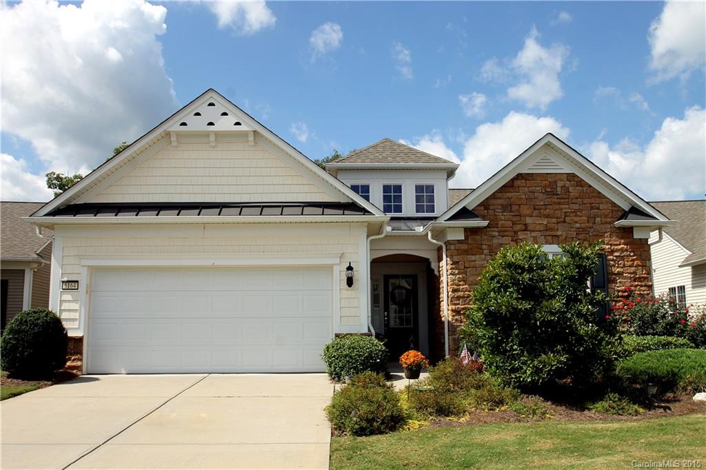 Vernon Hill w/ Sunrm & Paver Patio on Golf Course - Walking Distance to SCCL Amenities! Hardwoods throughout Living Areas. Incredible Open Floor Plan with Upgraded Stone Exterior. Custom Painted Foyer leads to Great Rm w/ Fireplace, Built In Cabinetry, & Formal Dining Area. Kitchen w/ Stainless Appliances, Granite Countertops, & Nook. Sunrm leads to Paver Patio w/ Sitting Wall & Private, Golf Course View! Master Suite & Private Bath w/ Dual Vanities, Shower, & Walk-In Closet. 55+ Comm