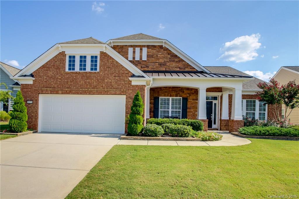 Fabulous Morningside Lane on oversized wooded lot with lake views! Upgrades include California Closets throughout, motorized blinds, crown molding, extra insulation, and more! 55+ Active Adult Community.