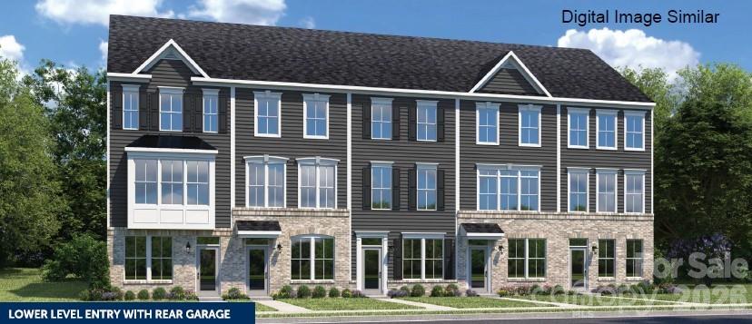 Welcome to Ashmore Square, a modern townhome community in Charlotte’s thriving Research Park District, ideally positioned near UNC Charlotte, the Vanguard Campus, and TIAA. Located less than 2 miles from I-85, this community offers quick access to Uptown Charlotte, University City, and major commuter routes. Everyday convenience and entertainment are just minutes away with IKEA, Topgolf, shopping centers, dining options, and nearby greenways all within close reach. Ashmore Square blends architectural style with low-maintenance living, featuring attractive brick and fiber cement exteriors, sidewalks, and a welcoming central courtyard designed for gathering or relaxing outdoors. HOA-managed lawn maintenance allows residents to enjoy community spaces without the burden of exterior upkeep. The neighborhood offers the ideal combination of connectivity, convenience, and modern appeal. The Clarendon floorplan delivers a flexible three-story layout designed to support a variety of lifestyles. The lower level includes a tandem two car garage or you can upgrade to a private bedroom with a full bath, ideal for guests, a home office, or additional living space. The main level features an open-concept kitchen with a spacious island and breakfast bar that flows seamlessly into the dining area and family room, creating an inviting environment for entertaining or everyday living. Upstairs, the owner’s suite includes a walk-in closet and ensuite bath, complemented by an additional bedroom and conveniently located laundry. Buyers may take advantage of closing cost assistance when using the preferred lender. Experience modern townhome living in one of Charlotte’s most connected locations—schedule your visit today to learn more about Ashmore Square and the Clarendon floorplan.