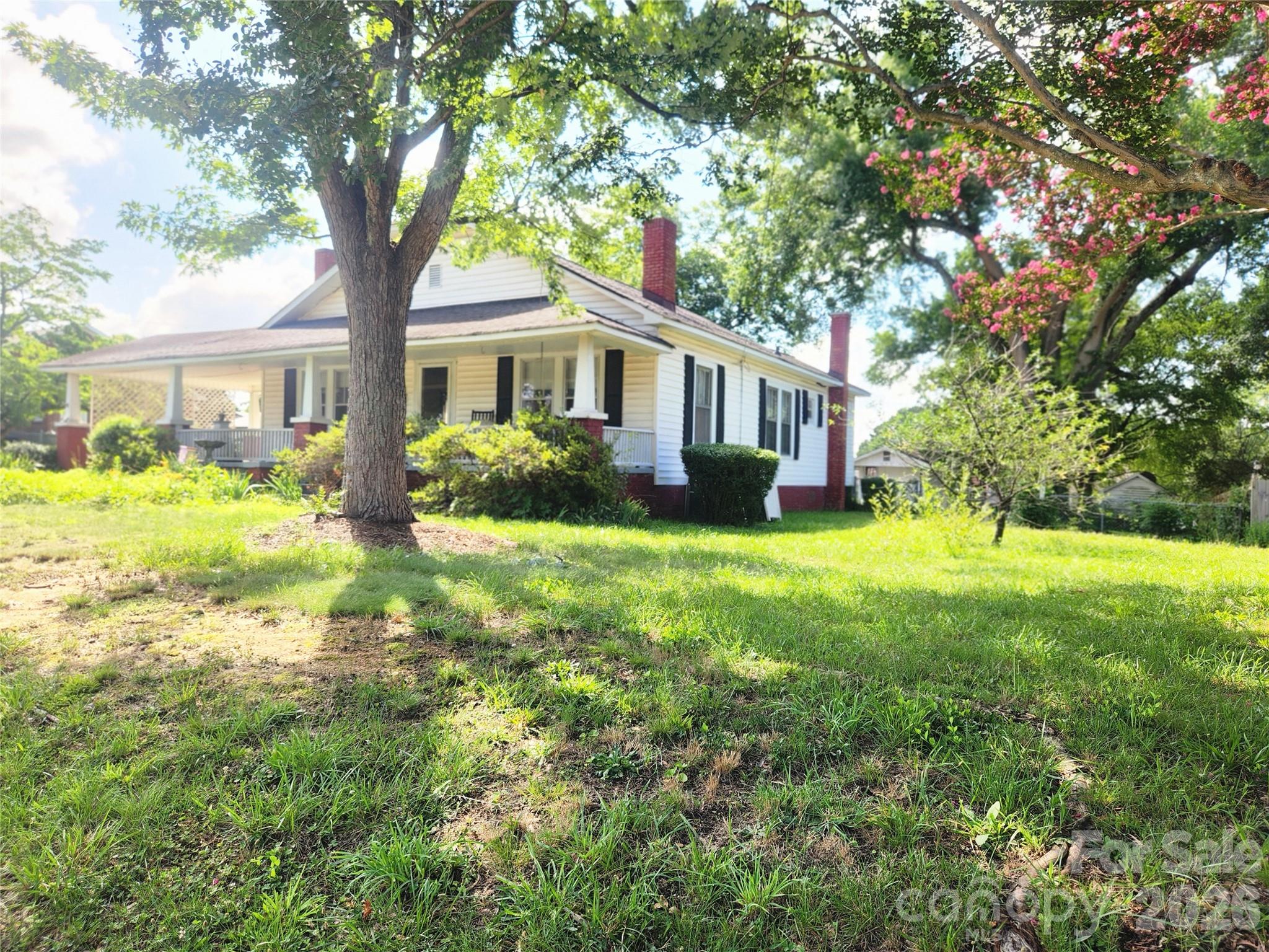Investor Opportunity or Perfect Project Home! This charming 3-bedroom, 1-bath home sits on a spacious 0.34-acre lot and is full of potential. Owned by just the second owner for approximately 50 years, it's ready for its next chapter. Relax on the oversized rocking chair front porch, perfect for enjoying your morning coffee or unwinding after a long day. The rear deck could use a little TLC but offers great outdoor entertaining potential. The home features solid bones and includes: 3 bedrooms and 1 full bath, Spacious laundry room and pantry (included in heated living area), Pull-down attic access with plenty of floored storage, Fenced backyard, Detached 1-car garage/workshop with attached storage, Additional outbuilding, previously used as a playhouse with vinyl flooring, Attached 1-car carport. Major updates include: Architectural shingle roof (approximately 10–15 years old), HVAC replaced in 2016, Water heater replaced in 2011. Quarterly pest maintenance by Acme Pest Control. Conveniently located just minutes from the hospital, shopping, restaurants, downtown, and easy access to I-85.
This home has been well loved and filled with decades of family memories. With a little updating, you can make it your own or add it to your investment portfolio. Home is being sold AS IS.