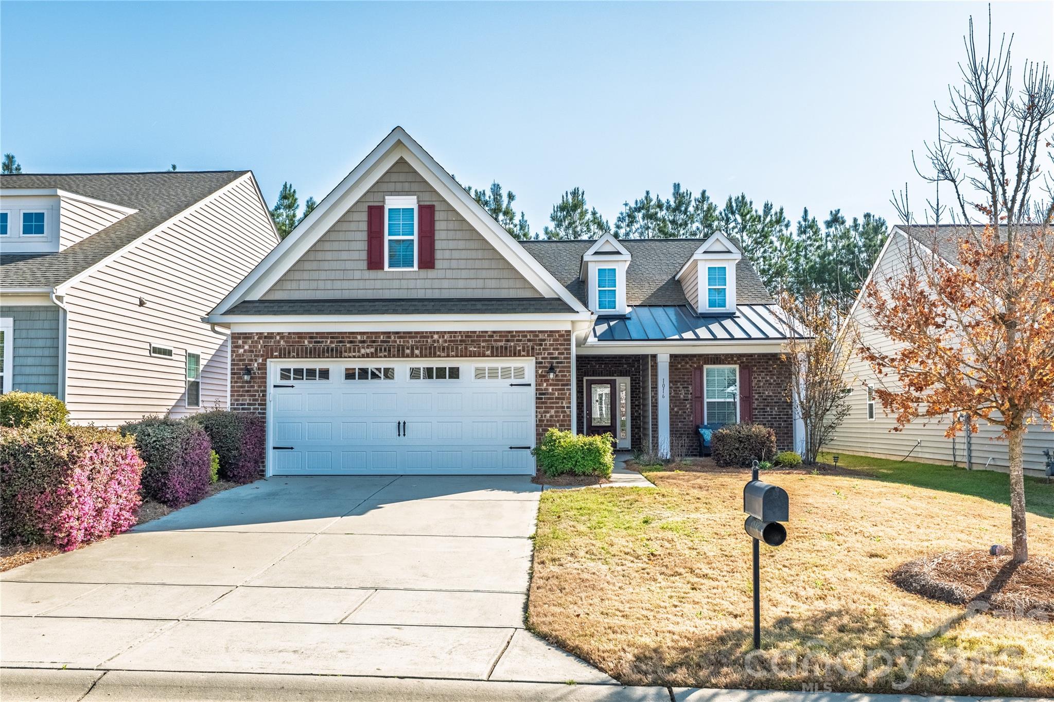 A Beautiful Place to Call HOME! Welcome to Carolina Reserve! A Lovely community where the lawns are maintained, and where your neighbors become new friends! The Charming Covered front porch greets every visitor! The moment you enter the spacious foyer you are greeted with gleaming hardwood floors bathed in natural light. The elegant dining room flows into the expansive Cooks kitchen. This kitchen has a definite "WOW" factor! Beautiful Granite counter tops, Stainless steel appliances, abundance of cabinetry, with pull-out shelving drawers! HUGE center prep Island w/ granite countertops and offer more cabinets below. This inviting kitchen, "WHICH IS the HEART of the HOME" boasts 2 separate areas for Breakfast Bar seating! Open & easy floor plan  boasts a stunning living Room where beautiful hardwood flooring continues! Central gas log fireplace creates a cozy atmosphere.  Need a Home Office? Flex room with French doors, could easily be your Study, home office or Den! Step out onto the tranquil screened-in porch for morning yoga, Coffee or a relaxing evening! Returning inside, you'll find the expansive primary suite, filled with natural light. The Primary Bedroom has new carpet & is complimented by a luxurious ensuite bathroom, boasting a double vanity and a sizable walk-in closet. A comfortable guest bedroom has new carpet w/a full bathroom located just off the foyer. The home is thoughtfully finished with a practical 2-car garage, accessed through the utility room just off the kitchen. Sidewalks throughout the neighborhood make it easy to enjoy a stroll or access the community amenities. Carolina Reserve offers a clubhouse, pool, fitness center, dog park, playground, and social activities. Conveniently located near new shopping and dining options along Highway 521, including Costco, Lowes Foods, Target, & Novant medical care. Quick access to major routes adds to the appeal. This home offers comfortable living in a prime location with amenities close at hand. 15 minutes to the Ballantyne area and major interstate highways!