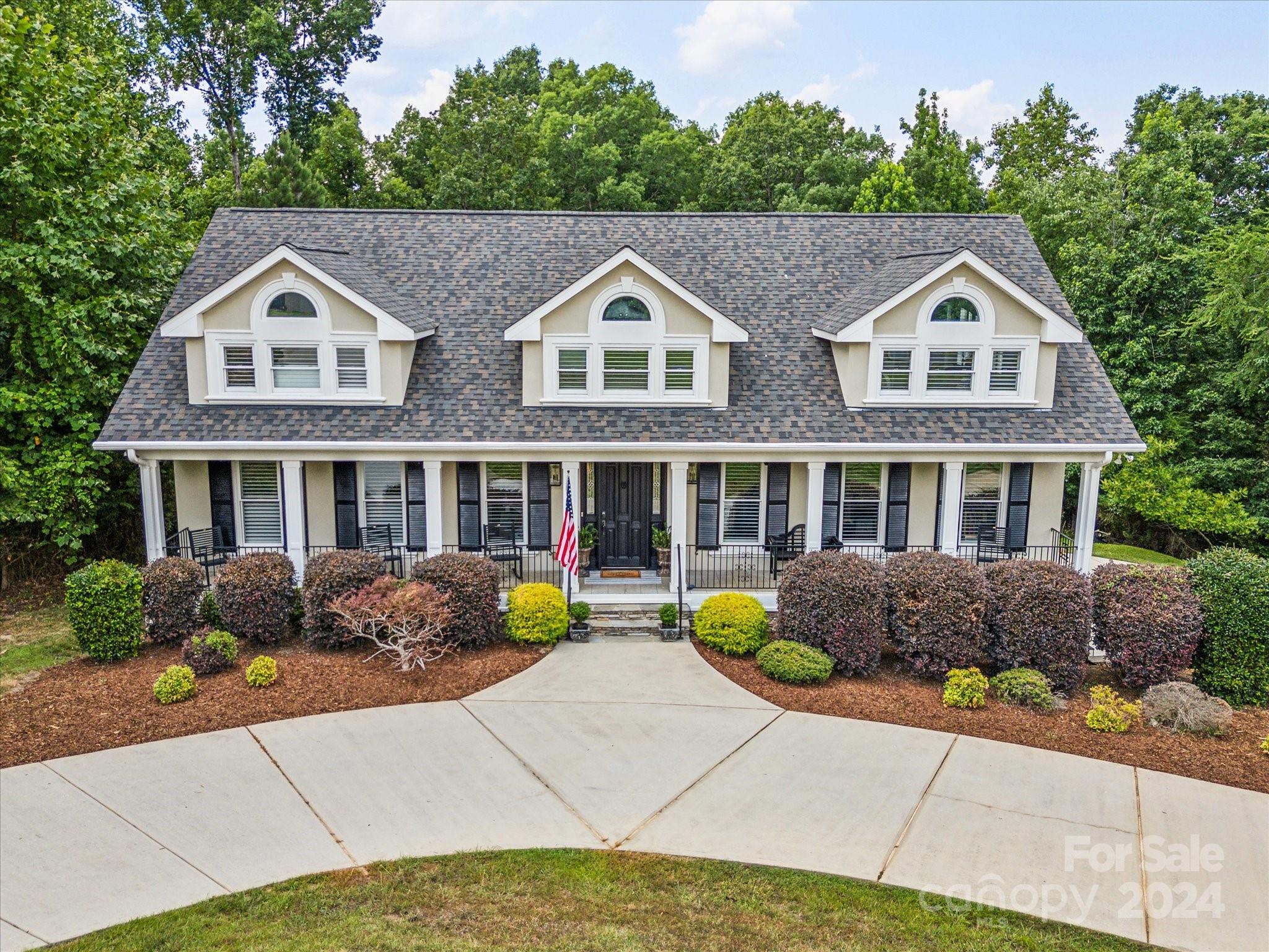 Welcome to your own private resort in the Lake Wylie, waterfront community of Liberty Point. Back on the market after countless improvements, including a new roof and HVAC to the first and second levels. An entertainer’s dream, the property features a circular drive, 3 car garage, salt water-infinity edge swimming pool, flanked by two gas fire torches, and 8 speaker surround sound. The pool and barbecue area are just steps from the second full kitchen, fan cave and fully loaded home theater room with raised leather reclining seats. Home features 2 gas
fireplaces, primary on the main, home office with French doors, three additional extra-large bedrooms upstairs, two with ensuite bath. The open main living area leads to a vaulted screened porch and oversized composite deck. All of this on over 2 acres, in the Clover School District, with no HOA. Book your showing today!