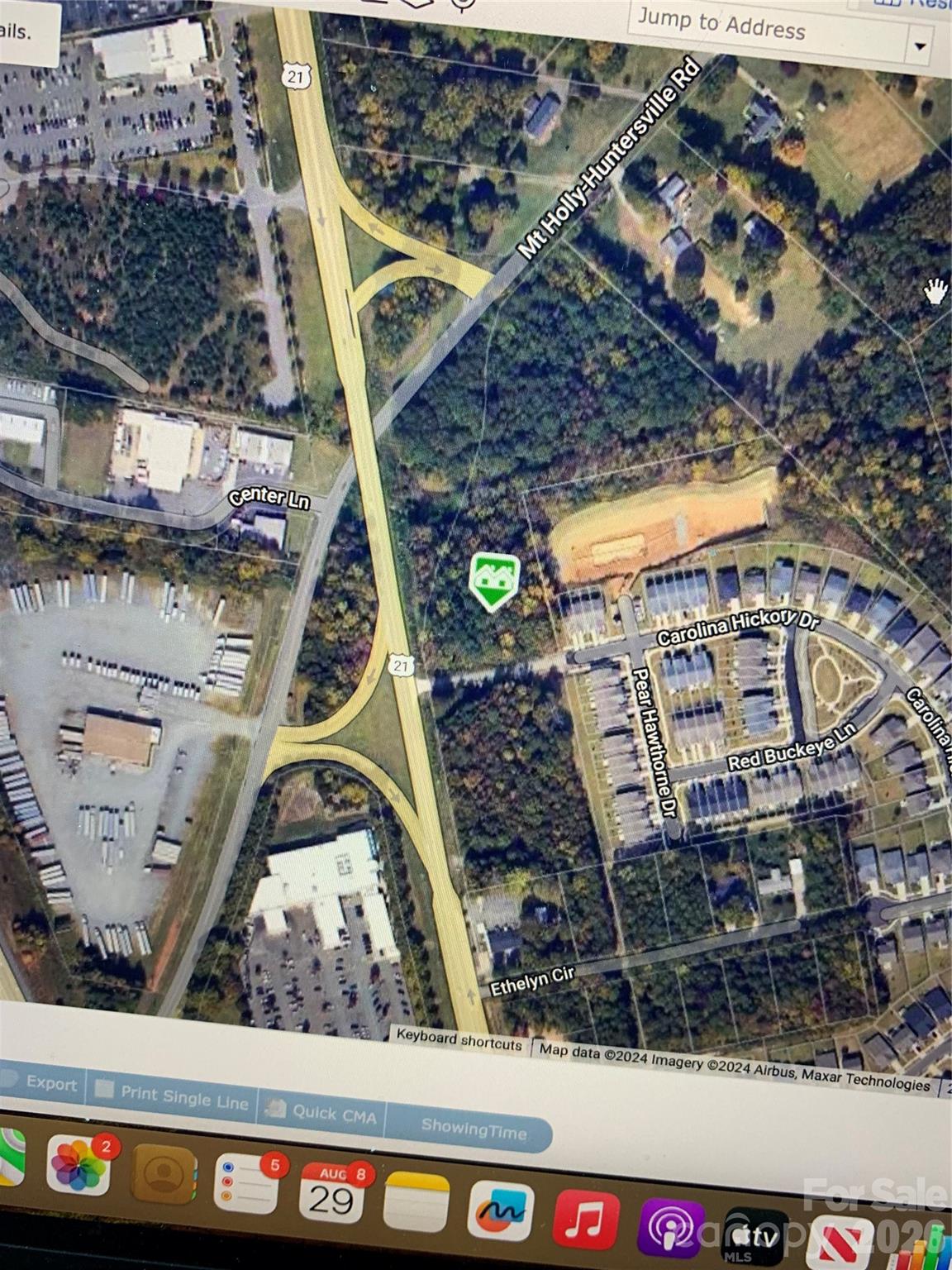 8.5 acres in Huntersville at intersection of Statesville Road, (highway 21) and Mt. Holly Huntersville road. Property is surrounded by commercial properties and touches HC. Directly across Hwy 21 from Honda car dealership and numerous other large businesses.  Property would need to be rezoned and approved by Huntersville NC.  Numerous types of development would work on this property, surrounded by new homes and development all over.  Close to Hospital and new car dealerships up and down 21.  Great mini storage site, retail, gas convenient store, shops.  Land can be divided into smaller parcels, price negotiable.