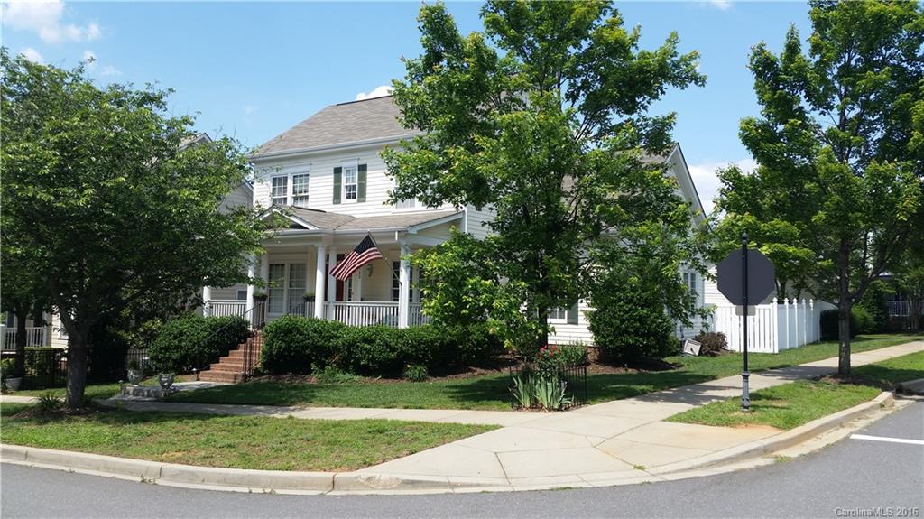 Beautiful one of a kind home. Bucknell floor plan in Baxter Village. Home sits on corner lot in town center. Walk to all the shops, restaurants, library, school, trails, etc. Lg mstr on the main. Hardwood floors throughout, with the exception of 3 newly carpeted BRs. Granite counters, stainless appliances. Great room with gas fire place. Relax on the big front porch. Located on a cherry blossom tree lined street, one of the prettiest streets in Baxter. This home is move in ready!