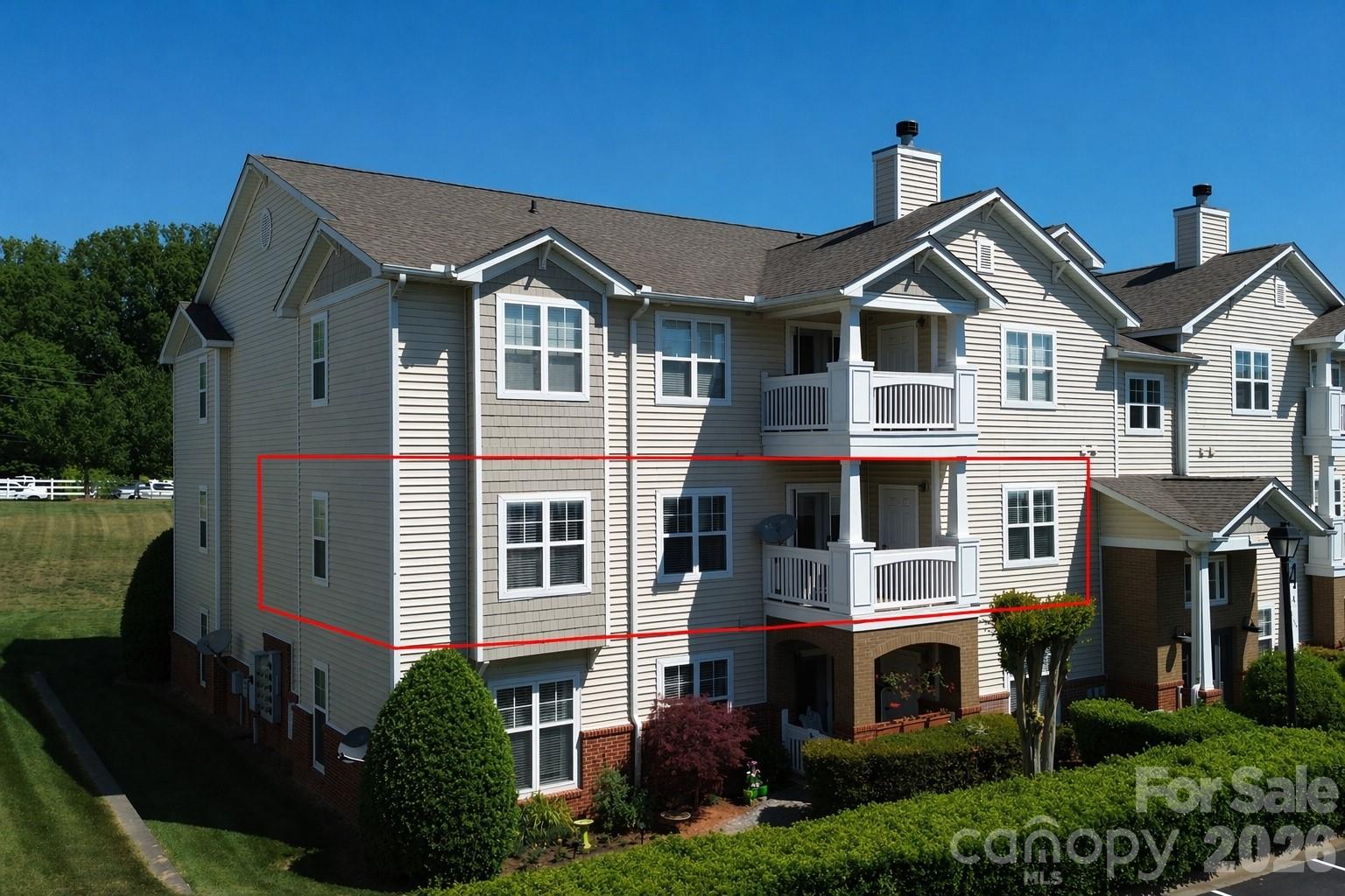 This second-floor end unit delivers what matters: move-in ready, bright, and priced right. No carpet. Two full bedrooms, a flex room that works as a home office or guest space, an open family room and nine-foot ceilings throughout. The primary bedroom has windows on two sides and genuine natural light throughout the condo.  *** New stainless steel kitchen appliances installed April 2026. ***Seller will install new HVAC system with full-price offer- a significant upgrade included in your move-in ready package.
The location works. McDowell Creek Greenway is steps away. Birkdale Village—dining, shopping, entertainment—is an easy walk. Ramsey Creek Park and Lake Norman are minutes away. The new Atrium Health hospital is nearby. 

The oversized primary suite offers real breathing room. Your private balcony has built-in storage. The building's dual-entry design keeps the hallways quiet. You get an assigned parking space.

Community amenities include a pool, clubhouse, and fitness center. HOA dues cover water and trash, so your monthly costs are straightforward and predictable. 

This is a stable, owner-occupied community. Owner-occupancy is required for the first two years, which means neighbors are invested long-term. Up to two pets are welcome.

Move-in ready, great location, solid price. This is what smart buyers are looking for.