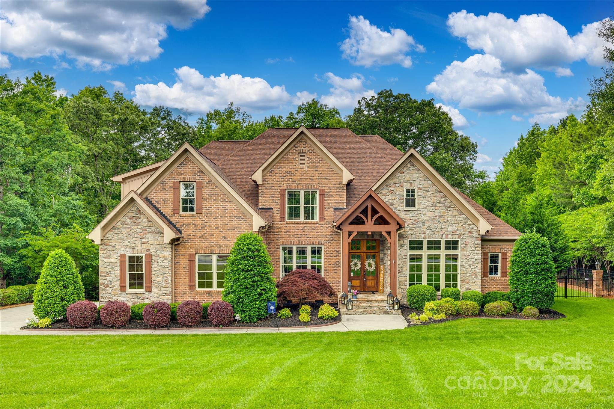 Welcome to your dream home! This exquisite custom-built property offers unparalleled luxury and comfort. Situated on a large, private lot in Millstone Creek, this home provides the perfect blend of tranquility and convenience. Excellent location just 4 miles from grocery and shopping center.

The spacious interior features updated wide plank hardwood flooring, enhancing the elegance of each room. Home includes a stunning rock fireplace, perfect for cozy evenings. The primary suite, located on the main floor, offers a private retreat with views of the tranquil back yard. Step outside to your own personal paradise. Large covered porch overlooking a sparkling pool, hot tub and out door fireplace ideal for entertaining guests or enjoying peaceful afternoons. This home truly has it all – from the inviting interiors to the expansive outdoor spaces. Don’t miss this opportunity to own a piece of paradise in an excellent neighborhood. Your perfect home awaits