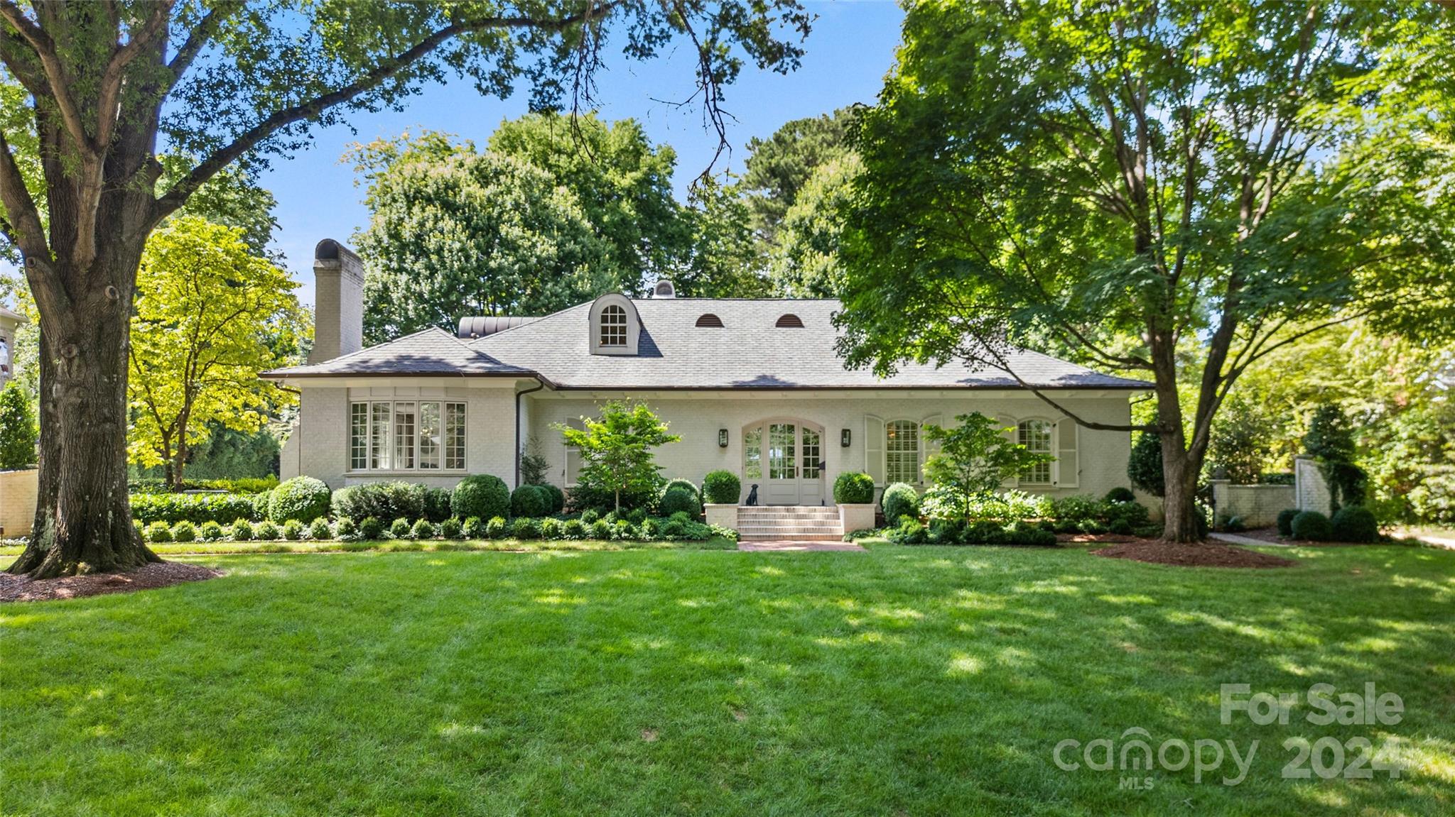 Welcome to Foxcroft! This stunning home, featured in Charlotte Home Design and Décor Magazine, is ideal for entertaining and everyday living with custom and high-end finishes throughout. Renovations by Alair Homes and Kelley Vieregg Interior Design. This property features a grand foyer with winding staircase. Open chef’s kitchen with large island, Thermador appliances, honed quartzite island, wonderful scullery - with shiplap siding, prep sink, ice maker, filtered water and custom cabinetry. Backyard outdoor living space includes a new (in 2021) wood burning fireplace and grilling area. New (in 2023) tankless water heater. Gorgeous yard. Convenient to SouthPark and Cotswold. Easy commute to uptown.