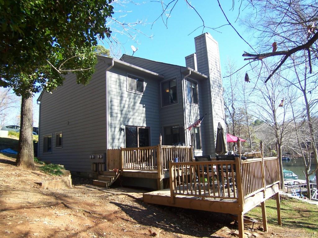 WATERFRONT townhouse located on beautiful Lake Wylie! Enjoy the spectacular sunset every night from your deck. This 2 bedroom, 2.5 bath end unit has upgraded hardwood floors, tile kitchen and all stainless appliances. Great room boast a wood fireplace and wet bar. Each bedroom has their own full bathroom. Deeded boat slip. Perfect location living on the lake and close to everything! Call today!