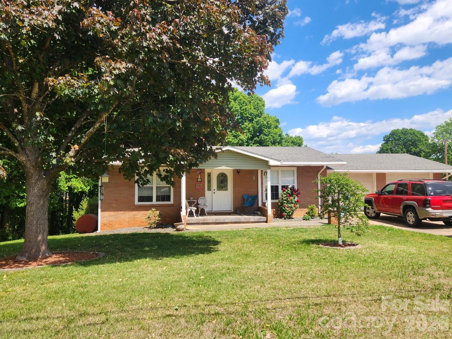 This charming one-story home with a fully finished basement, offers the perfect blend of comfort, functionality, and outdoor living. Featuring 3 bedrooms, 2 bathrooms, and a versatile office/flex space, this home adapts effortlessly to your lifestyle—whether you’re working from home, hosting guests, or creating your dream hobby space.

Inside, you’ll find thoughtful upgrades like a central vacuum system with attachments included, making everyday living a breeze. The cozy wood-burning fireplace adds warmth and character, creating the perfect gathering spot.

Step outside and the property truly shines. Enjoy multiple outdoor entertaining areas, including a spacious patio ideal for relaxing or hosting. Cool off in the inground pool, fully enclosed by a privacy fence for your own private retreat. Garden enthusiasts will love the established vegetable garden, along with berry bushes and mature fig trees in the side yard.

For those seeking a bit of homestead charm, the backyard also includes a goat pen, offering unique possibilities for hobby farming or simply enjoying a more self-sufficient lifestyle. A convenient shed located next to the pool provides additional storage for tools, equipment, or outdoor essentials.

This property offers a rare combination of indoor comfort and outdoor versatility—perfect for entertaining, relaxing, and living life your way.