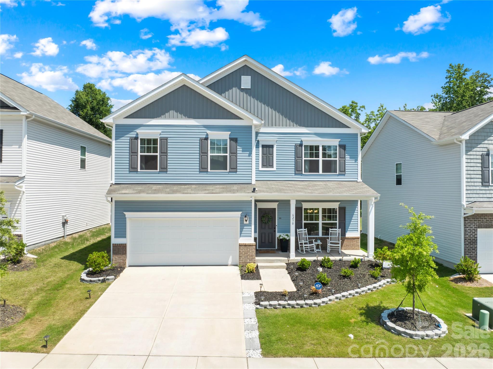 Welcome to 6230 Gala Lane, a meticulously maintained 2024 built home 4 bedrooms, 2.5 bathrooms, and nearly 2,500 square feet. Perfectly positioned on a flat, cleared lot backing directly to Reedy Creek Nature Preserve, you'll enjoy exceptional privacy with miles of hiking and biking trails, a disc golf course, dog park, cricket grounds, and countless outdoor recreation opportunities just beyond your backyard. Inside, the open concept floor plan is ideal for both everyday living and entertaining. The spacious kitchen flows seamlessly into the living area and offers ample room for a portable island, bar cart, or even the addition of a permanent island to suit your needs. A formal dining room provides flexible space for hosting holidays, dinner parties, or a home office. Upstairs, the generously sized primary suite features an elegant tray ceiling, spacious walk-in closet, double vanity, and relaxing garden tub. Large secondary bedrooms, oversized closets throughout, and a conveniently located upstairs laundry room make for easy everyday living. Additional highlights include a covered front porch, two-car garage, neighborhood sidewalks, and convenient access to the nearby light rail station for an easy commute. Ideally located just minutes from UNC Charlotte, Uptown Charlotte, shopping, dining, and major highways, this move-in-ready home offers the perfect combination of modern construction, natural surroundings, and unbeatable convenience. An Entek 5-stage refiner, whole house water filtration system conveys, a $6500 value, purchased in 2024!