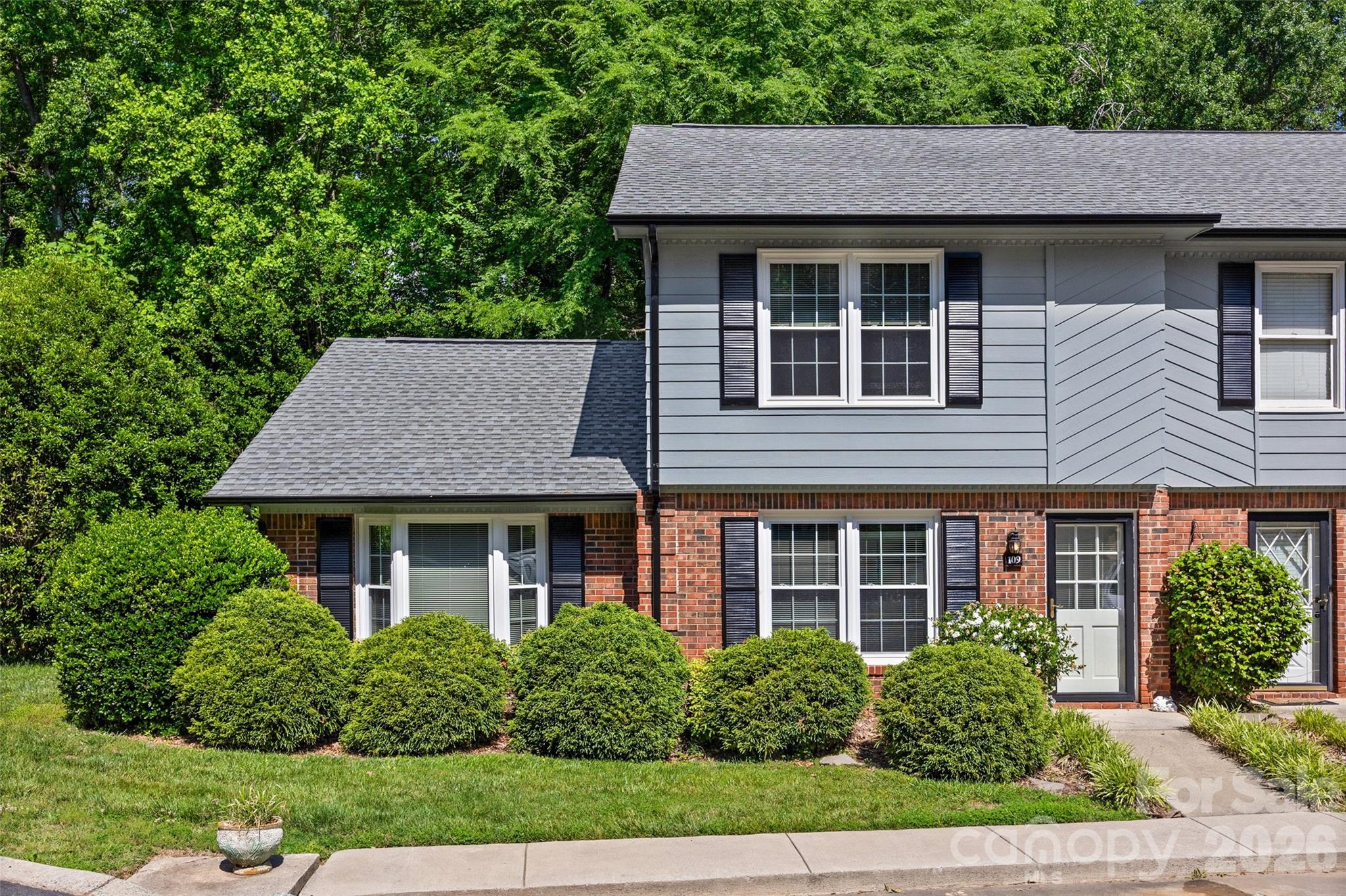 Welcome home to this well-maintained end-unit townhome in the highly sought-after Fort Mill area! Offering 3 bedrooms and 2 full bathrooms, this home features fresh paint, a newer HVAC system (2019), and a comfortable, low-maintenance lifestyle in a fantastic location.

The spacious kitchen and dining area overlook the private backyard through a wall of windows, bringing in wonderful natural light. The main-level primary suite includes a private bath and walk in closet with access to the screened porch.  Additional bedrooms on the 2nd level provide flexibility for guests, hobbies, or a home office.

Enjoy relaxing mornings or quiet evenings on the large screened porch and backyard deck. Conveniently located near the Anne Springs Close Greenway, the Springs Complex, shopping, dining, and with quick access to both Charlotte and Rock Hill. Residents also enjoy access to the community swimming pool just steps away.

The HOA covers exterior maintenance, roof, trash service, lawn care, and leaf blowing, making everyday living even easier.