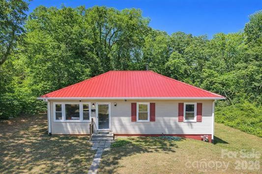 This well maintained ranch offers incredible potential with a full unfinished basement perfect for storage, a workshop, or future expansion. The home features maintenance free vinyl siding, upgraded windows, and a new metal roof, giving you peace of mind for years to come. Inside, you'll find 3 bedrooms and 1 bath on the main level, with hardwood floors under the carpet just waiting to be revealed. Major systems have already been updated, including the HVAC and water heater. New roof installed 2026. Some furnishings have been virtually staged. Owner is inactive real estate agent. Current owners have laundry upstairs in bedroom but hookups are also downstairs.