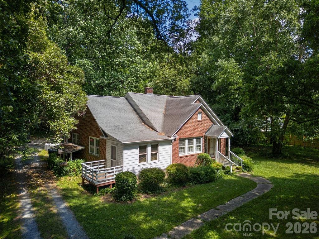 Opportunity awaits on this rare 1.44-acre property in a rapidly growing Charlotte location! This full brick ranch offers approximately 1,750 heated square feet with 3 bedrooms, 2 full baths, spacious living areas, and endless potential to make it your own. Situated on a level homesite with mature trees, the property provides the privacy and space that's increasingly hard to find while remaining just minutes from I-85, I-485, UNC Charlotte, shopping, dining, and Uptown Charlotte.
Whether you're looking for a primary residence to renovate, an investment opportunity, or land for future possibilities (subject to zoning and approvals), this property offers incredible flexibility. Additional features include an unfinished basement for storage or workshop space, enclosed porch, deck, fireplace, and ample room for gardening, recreation, or expansion.
Being sold As-Is. Don't miss this unique opportunity to own acreage in one of Charlotte's fastest-growing corridors!