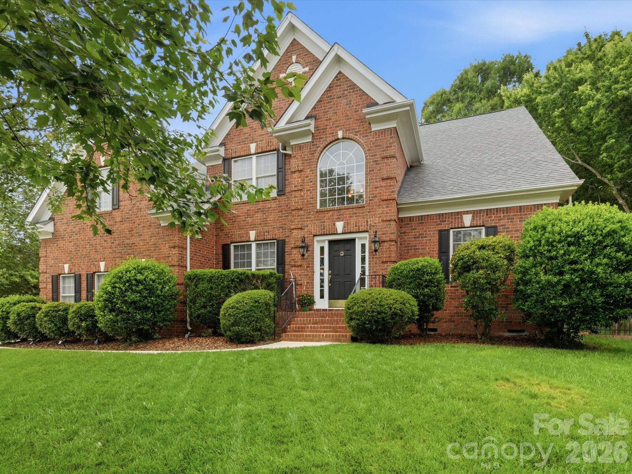 Exquisite home in Quellin.  All brick, over 4300 sq ft 4 bedroom plus office and bonus room, 3.5 bathroom estate on a culdesac lot.   Primary suite on the main level, with an additional primary suite upstairs.  Once you enter the home, the open concept living and dining room lead you to the grand gathering room.  Great room has 2 story ceilings, fireplace and french doors to your veranda.  Large open kitchen space with beautiful wood cabinets, granite counter tops, island with cooktop and sink, corner sink with lovely windows, new dishwasher, new cooktop.   Primary suite features trey ceiling, sitting bay area with french doors to your private covered veranda / patio area, lovely decorative molding and wall sconces.  Primary ensuite bathroom features garden tub, large walk in shower, dual sinks and tons of countertop and cabinet space.  Walk in closet with custom shelving, room for everything!  Upstairs you will find a large study with fireplace and custom built in desk and shelving.  A large catwalk connects all 3 bedrooms and bonus room, one bedroom could be an additional primary suite with its own ensuite bathroom, 2 closets and ceiling fan.  Large bonus room could be used as an additional bedroom.  At the end of the catwalk is a back stair case that leads you to the laundry room/ kitchen area.  Laundry room features tile floors, utility sink and cabinets for storage.  There is a generous walk in pantry for all your items.  Once outside on your veranda with brick columns and iron railing you enjoy the view of your lush backyard with landscaping and mature trees.  Fenced in backyard with brick columns and lights, in ground irrigation system, culdesac home, too much to list.  Lovingly cared for by the owners, new roof 2020, AC units 2015/2019.