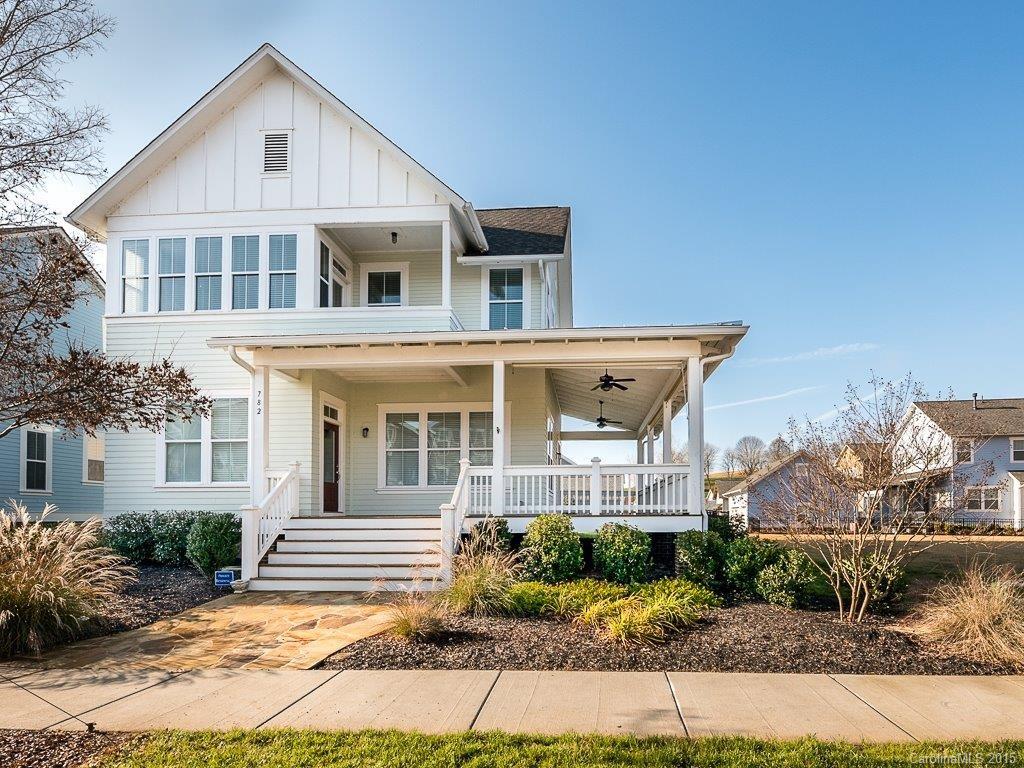 Fabulous 2 story home located on Corner Lot in Riverwalk! Fully fenced in w/ huge wrap around porch for enjoying the outdoors views or entertaining guests outdoors! Nice open floor plan on main w/ gleaming hardwood floors throughout main. Gas log fireplace in great room creates a cozy ambiance at night.  Granite counters, large center island, SS appliances & pantry in Kitchen.  Loft upstairs w/ access to the 2nd story porch that allow for gorgeous views of the river! Great location a must see!
