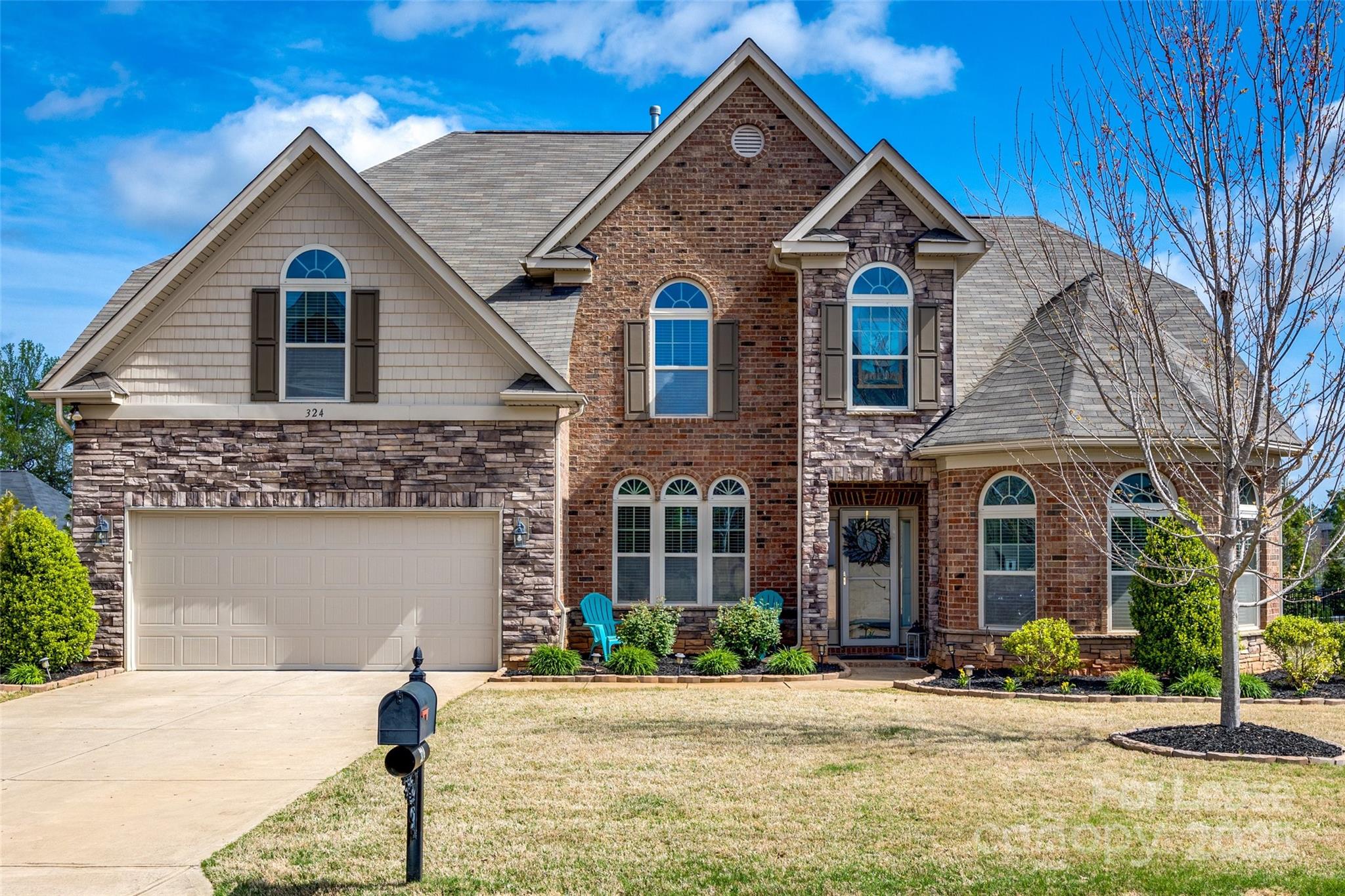 Stunning 4-Bedroom, 3.5-Bath Full Brick Home in Tullamore of Clover.  This well-maintained 3,659 sq. ft. home offers 4 bedrooms, 3.5 baths, and two bonus rooms. The open layout features a primary suite on the main level with a tray ceiling, sitting area, and spa-like bath. One upstairs bedroom has an en-suite bath and could be used as a second primary. The chef’s kitchen boasts stainless steel appliances, a gas cooktop, granite countertops, tile backsplash, bar seating, and ample storage with pull-out lower cabinets, flowing into the great room with a coffered ceiling and gas fireplace. A formal dining room with wainscoting leads to a butler’s pantry, while a vaulted office provides a quiet retreat. Upstairs offers three spacious bedrooms and two flexible bonus rooms. The private backyard includes a covered and extended patio perfect for relaxing or entertaining. Minutes from Lake Wylie and Field Day Park. Pets Conditional. No Cats.