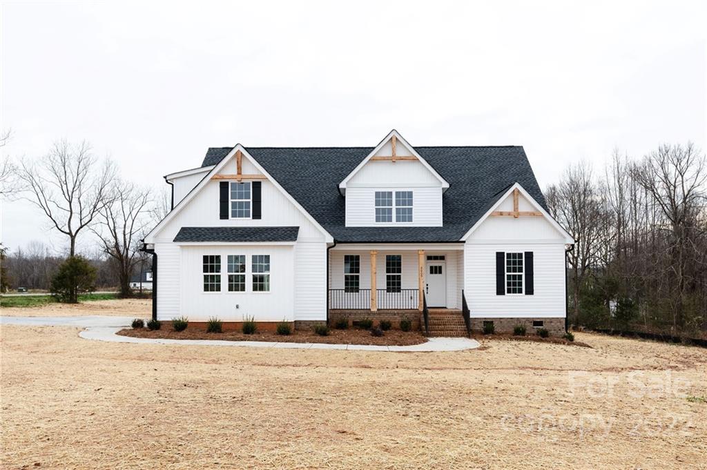 Beautiful new construction in the Clover School District.  Home offers primary bedroom suite on main level with beamed ceiling.  Primary bath includes freestanding tub, double vanity and barn door.  Additional bedrooms on the second level.  Covered front porch.  Screen porch on the back.   Features include LVP Flooring, fireplace in family room, cedar beams, barn door at the flex and primary bath. Kitchen features gas range/range hood and microwave.
Sanders Landing now has boat/RV storage.For information contact ams@aimshoa.com.