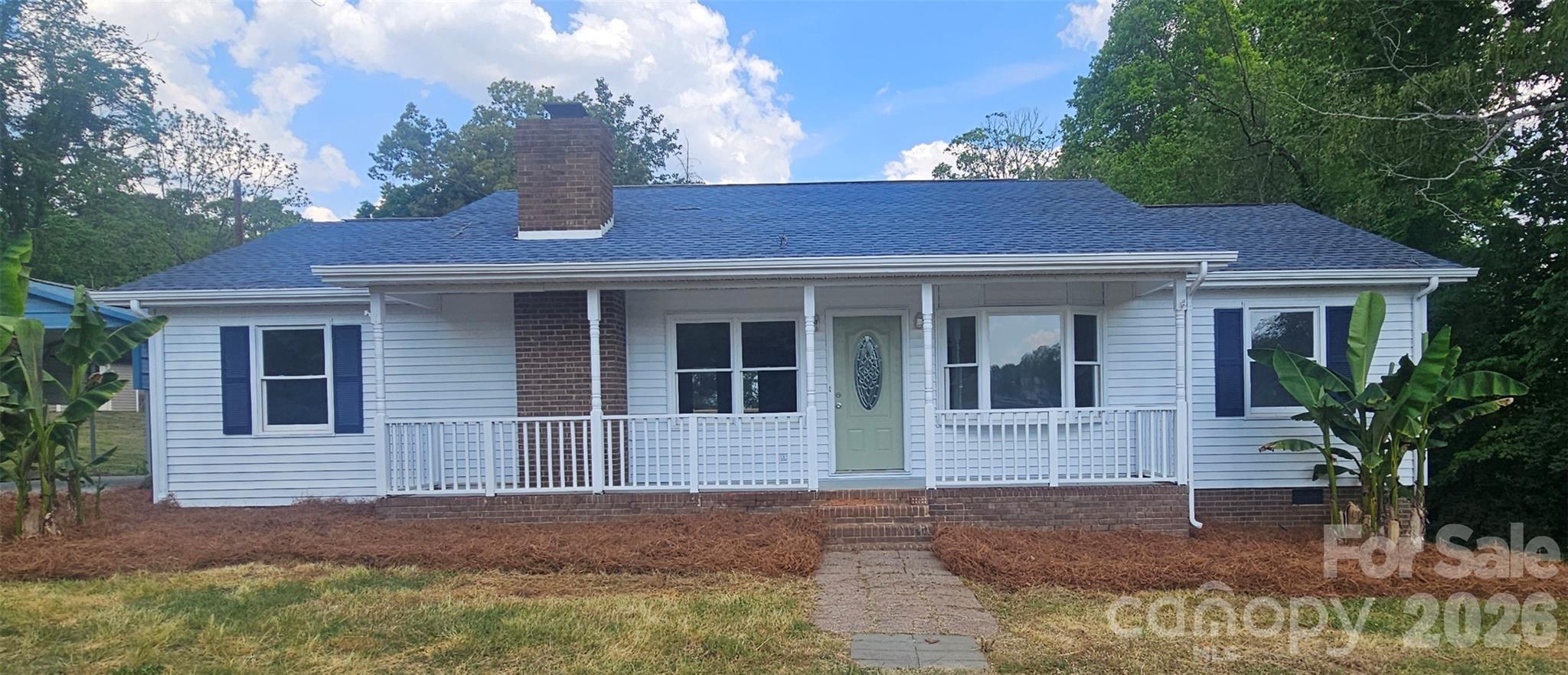Wonderfully remodeled ranch home ready to go! New flooring, paint and lighting fixtures throughout with soothing greys and whites and silver touches. Kitchen has new countertops, backsplash and fixtures.  Stove can be gas or electric depending on your taste and an icemaker connection. Both full bathrooms have been updated and sparkle! Spread out in this split floorplan ranch and have a bonus space/office/playroom/storage room/whatever your heart desires. Another great perk is the mud room with its separate entrance, space for pantry shelving and electric or gas dryer hookup! Wait don't forget, the hot water tank is in there also but its tankless! Never wait forever for the water to heat up! Outside you can watch the sun come up on your covered front porch or grill with friends on the huge back deck overlooking the back yard.  Store all your yard tools or hobbies in the shed out back or in the walk-in crawl space below the house. Everything about this house screams welcoming, from the rocking chair front porch to the circle drive in front as well as the circle drive going around back.  Lastly enjoy the heart of Bessemer City with the community events, laid back downtown area, fun night life and charming side roads for walking and exercising by living just a minute away.