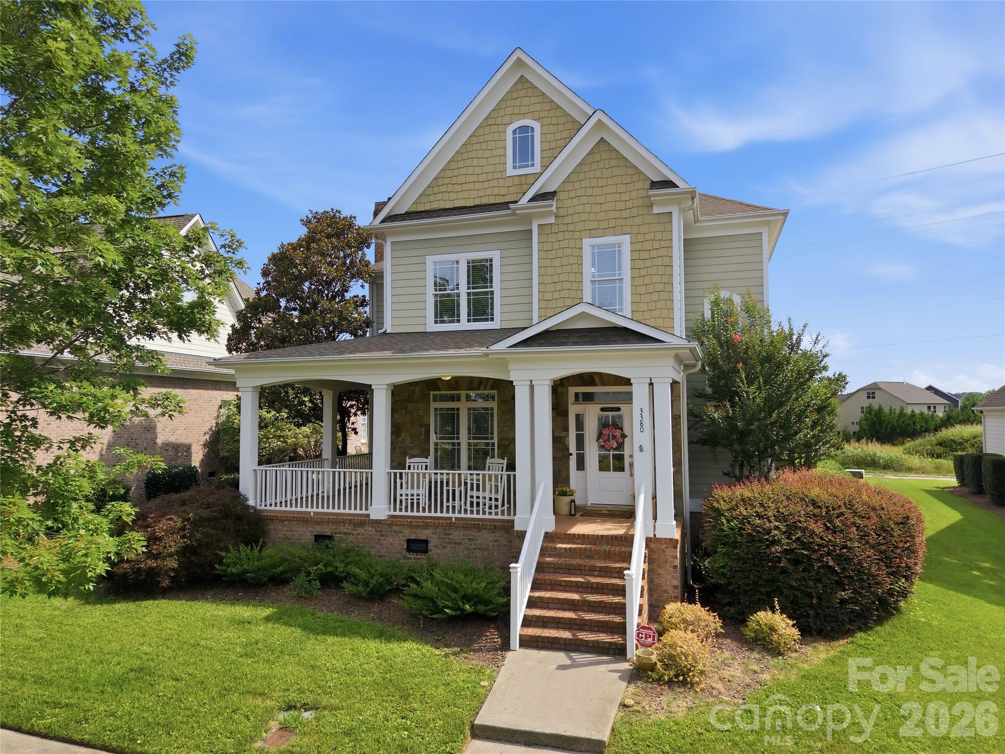 Welcome home to this beautifully updated 4-bedroom, 3.5-bath residence that perfectly blends comfort, style, and convenience. Thoughtfully designed with a highly sought-after primary suite on the main level, this home offers a spacious retreat featuring a spa-inspired bath with a soaking tub, dual vanities, separate shower, and a generous walk-in closet.

The light-filled floor plan provides plenty of room to spread out, with three additional bedrooms upstairs plus a versatile bonus/flex room ideal for a media room, playroom, home office, or guest retreat. It is a move-in-ready space you'll love coming home to.

Step outside and unwind on the charming wraparound porch, perfect for morning coffee, evening relaxation, or gathering with family and friends.

Enjoy an exceptional lifestyle with HOA dues that include basic cable, internet, and access to outstanding community amenities, including a clubhouse, pool, fitness center, playground, basketball and tennis courts, volleyball court, picnic areas, and sidewalks throughout the neighborhood.

Private greenway access behind the home. Easy walk to pool and playground.

Lowes Foods just opened almost next door! Easy access though the neighborhood!

Conveniently located just minutes from I-85, shopping, dining, and everyday conveniences, this home offers the perfect combination of space, updates, and community amenities.