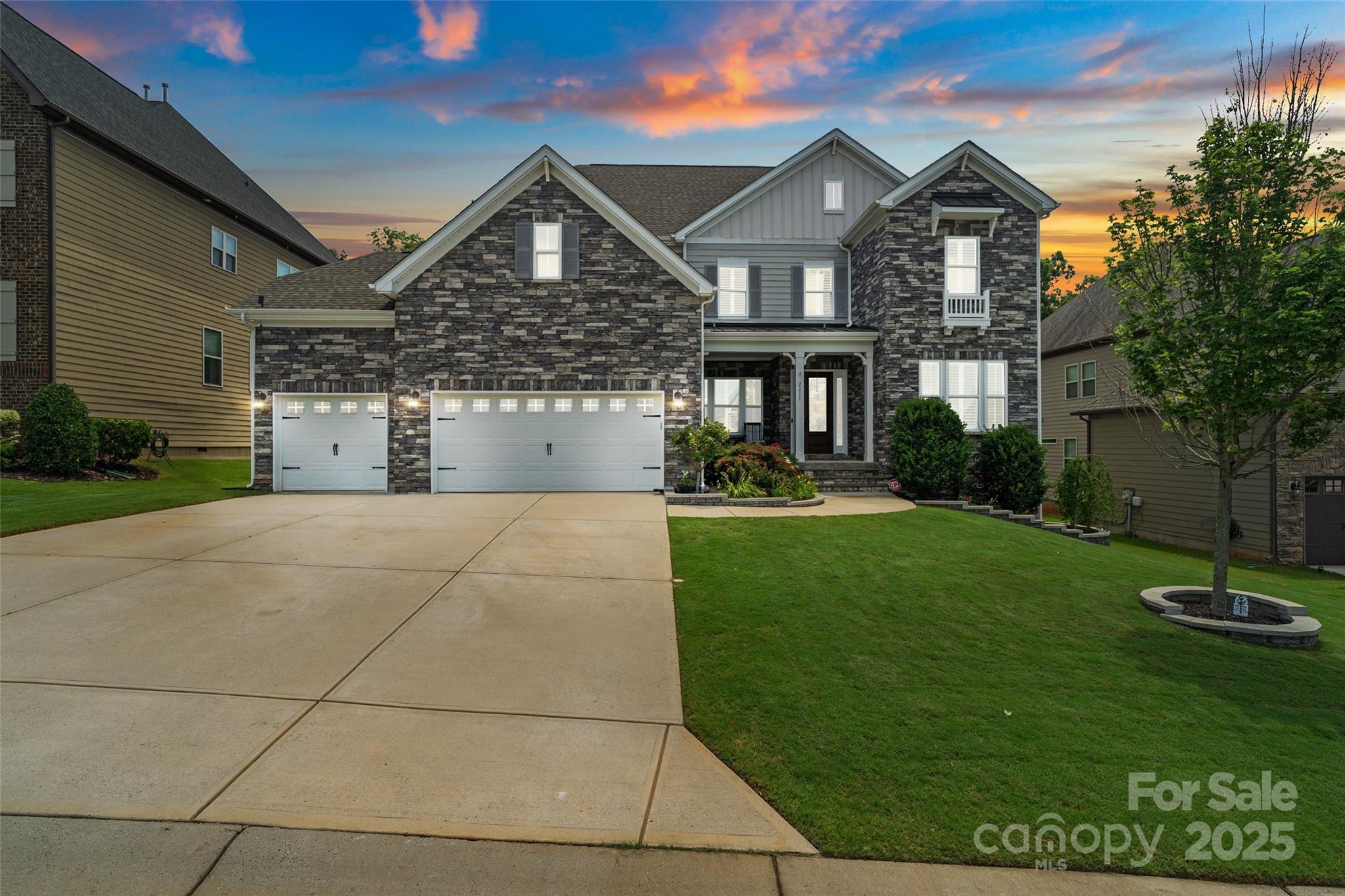 Welcome to this exquisite home in Waterside at the Catawba. This stunning home showcases an open & airy layout filled w/natural light & refined touches. The main level offers a guest suite, living room w/cozy fireplace, formal dining & designer kitchen featuring an oversized island, walk-in panty, gas cooktop & heated exhaust hood. A striking wrought iron gate leads to the wet bar. You’ll also find an office, sunroom & screened porch w/2nd fireplace. Upstairs, the luxurious primary suite is a true retreat w/spa-inspired bath, freestanding soaking tub, oversized shower w/side jets & rainfall feature & direct access to the laundry. A spacious rec room completes the 2nd floor. The 3rd level offers a private bedroom w/its own ensuite bath. Step outside to a beautifully fenced yard that opens to tranquil wooded views, complete w/a paver patio & firepit. Resort-style amenities include a clubhouse, fitness center, pool, playground, sports courts & community dock w/access to the Catawba River.