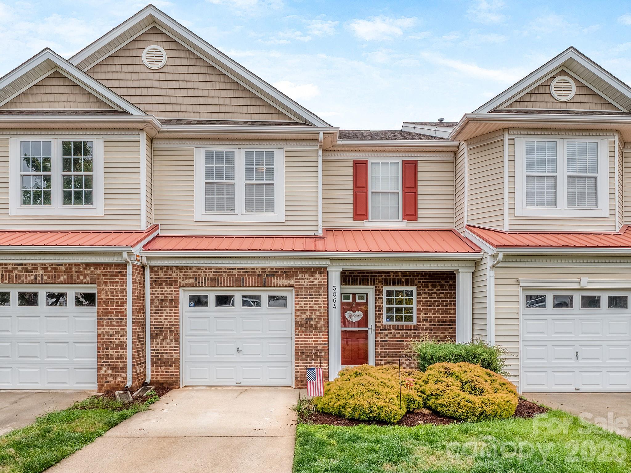 A true gem in sought after Arlington community! This beautifully updated townhome is filled with natural light and features and inviting open floor plan designed for comfortable living and effortless entertaining  Thoughtful upgrades throughout make this home truly stand out.
Luxury vinyl plank flooring spans the entire main level, creating a seamless flow from the front entry to the back patio.  The renovated kitchen showcases refaced cabinetry, additional storage cabinets, a spacious island with breakfast bar seating and storage, stunning granite countertops, and a stylish glass tile backsplash.  Updated lighting adds a fresh, modern touch.
Upstairs, the versatile loft area offers the perfect flex space for a home office, reading nook or workout area.  Two generously sized bedroom suites each feature their own private full bath, making this layout ideal for roommates or welcoming guests in comfort.  The upstairs laundry closet adds convenience, and the washer and dryer convey with the home.  One of the bonus features of this home is the one car attached garage-a valuable amenity not found with all townhomes in the community.
Step outside to the rear patio overlooking an expansive HOA maintained green space-a wonderful setting for relaxing or outdoor activities.  Residents enjoy access to community amenities including a pool, clubhouse and basketball court.  
Great school assignments and every imaginable convenience is close by.  Commute to Uptown Charlotte is 21 miles, Charlotte Douglas Airport is 23 miles.
This special home combines style, function, and location-a great opportunity in Arlington!
