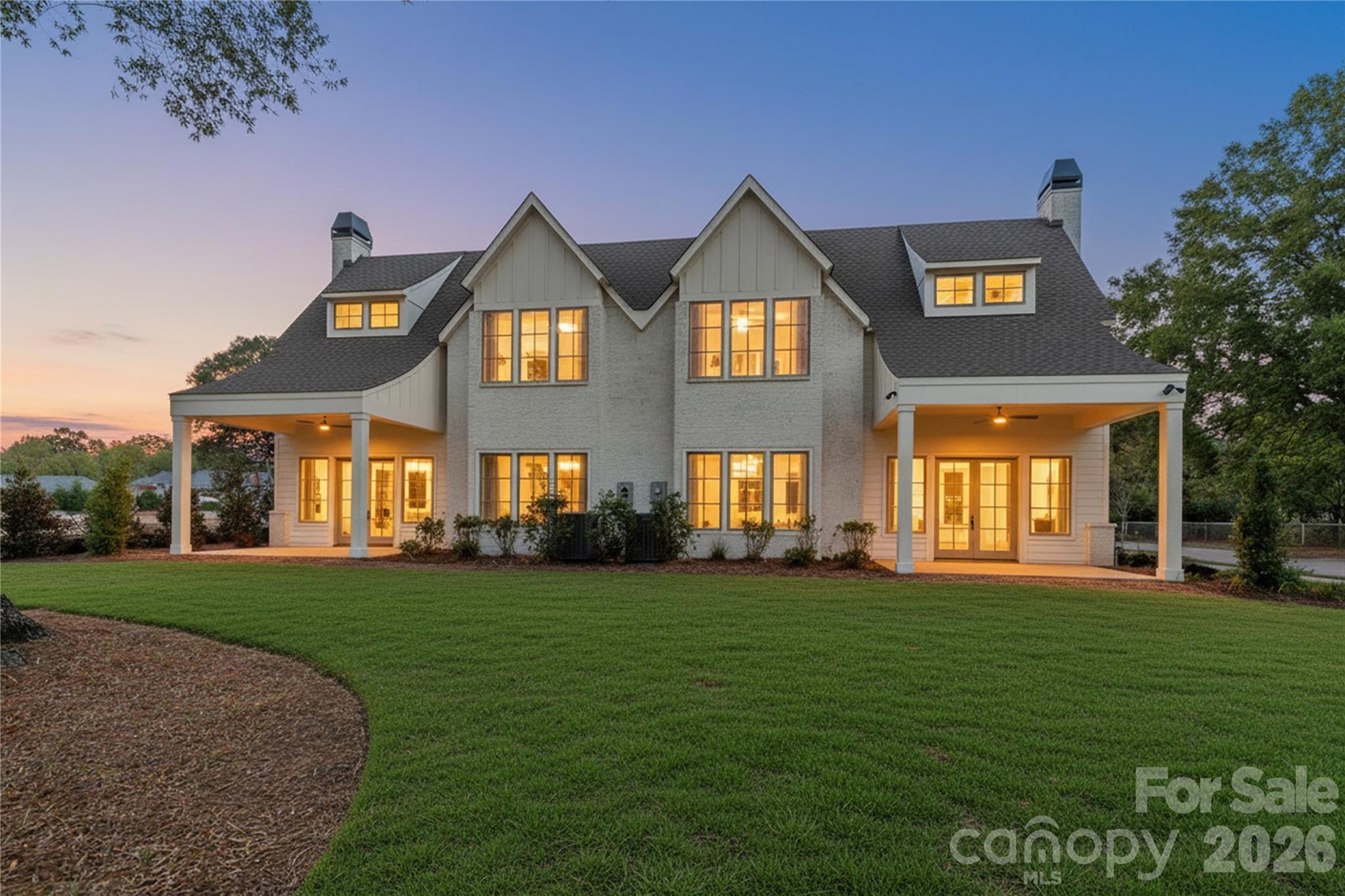 Ferncliff at Cotswold presents Duet #4, one of only four luxury townhomes starting at $1,699,900 in one of Charlotte’s most desirable neighborhoods, just minutes from Uptown. This thoughtfully designed residence offers a main-level primary suite, open-concept living, and elevated designer finishes throughout. The chef’s kitchen features Bosch appliances, an oversized island, and a seamless flow into the dining area and great room, creating an ideal setting for entertaining. A covered rear lanai extends the living space outdoors. Upstairs includes two additional bedrooms and a spacious flexible living area easily suited for a fourth bedroom, media room, or office. Nestled within a walkable, tree-lined enclave in Cotswold, enjoy close proximity to premier shopping, dining, medical centers, and everyday conveniences. Limited opportunities remain. 
Some images shown are of the furnished model home for illustrative purposes only. Features, finishes, and selections may vary.
